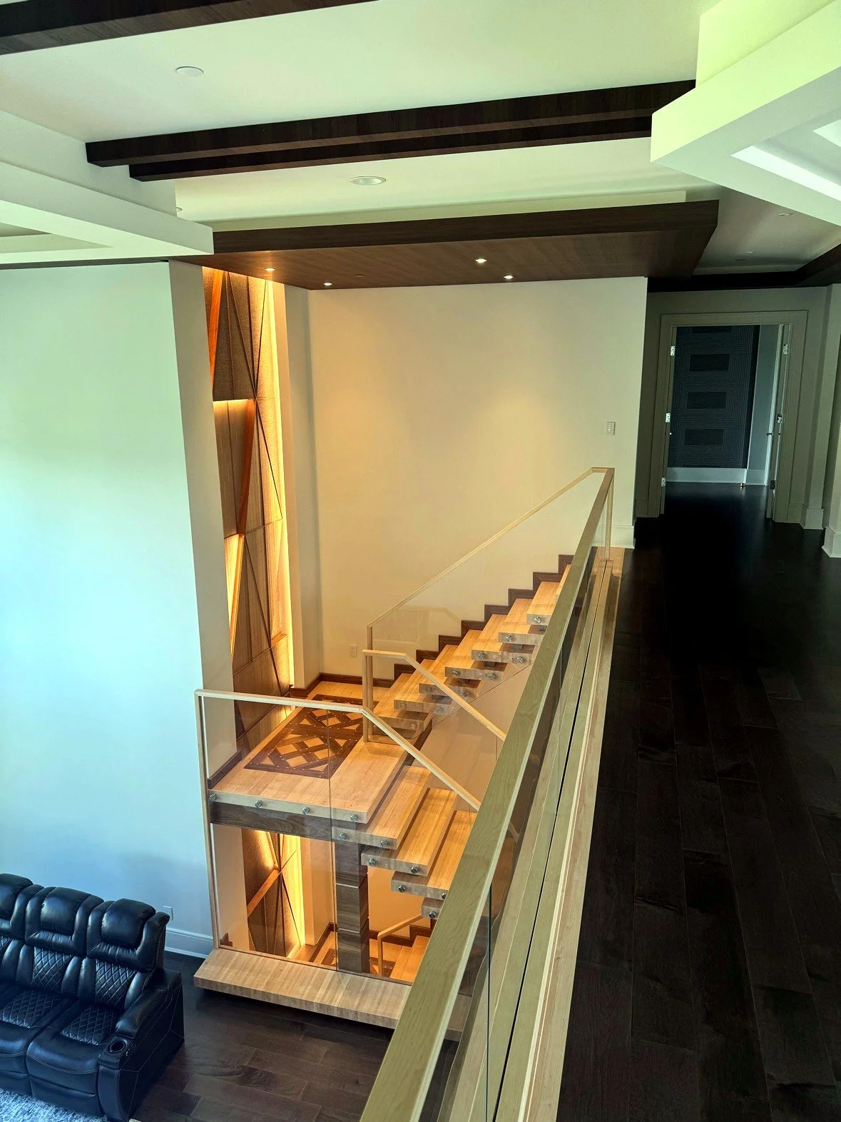 The Blockley stacked-block staircase, finished flight seen from the upper hall
