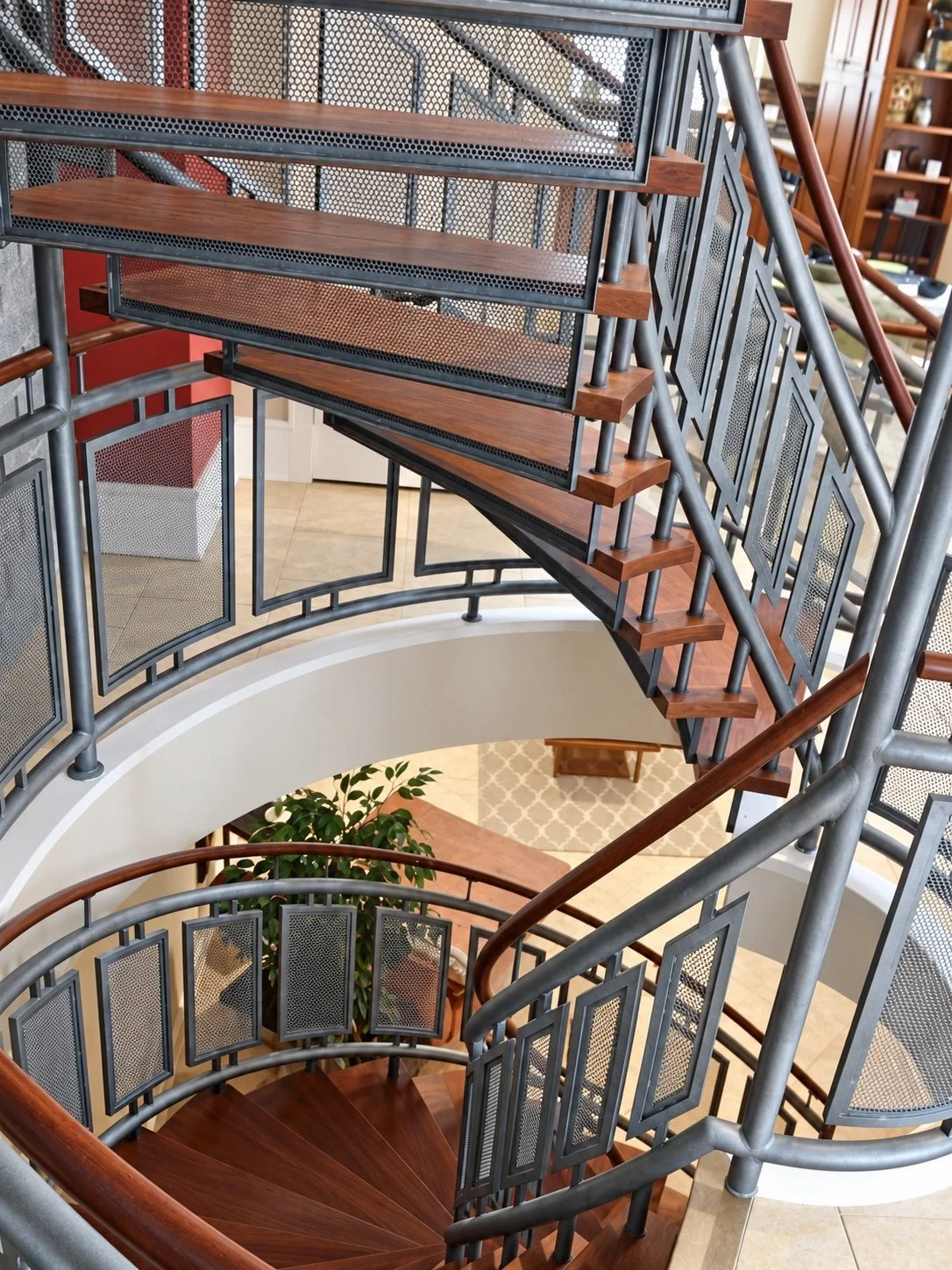 Curved mesh stair, looking down the stairwell