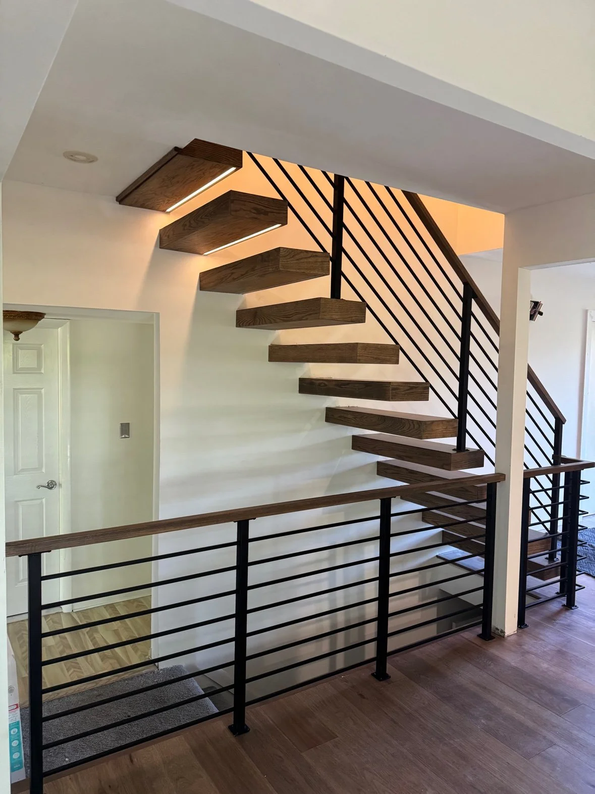 Full flight with landing railing and wood handrail