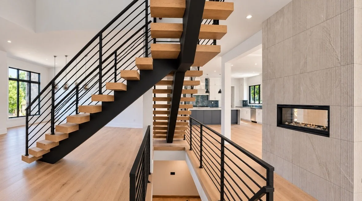 Floating switchback stair with cable railing