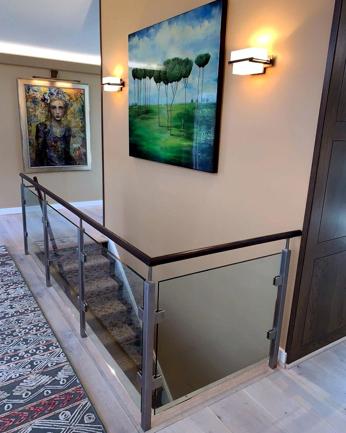 Glass railing on posts with clamps