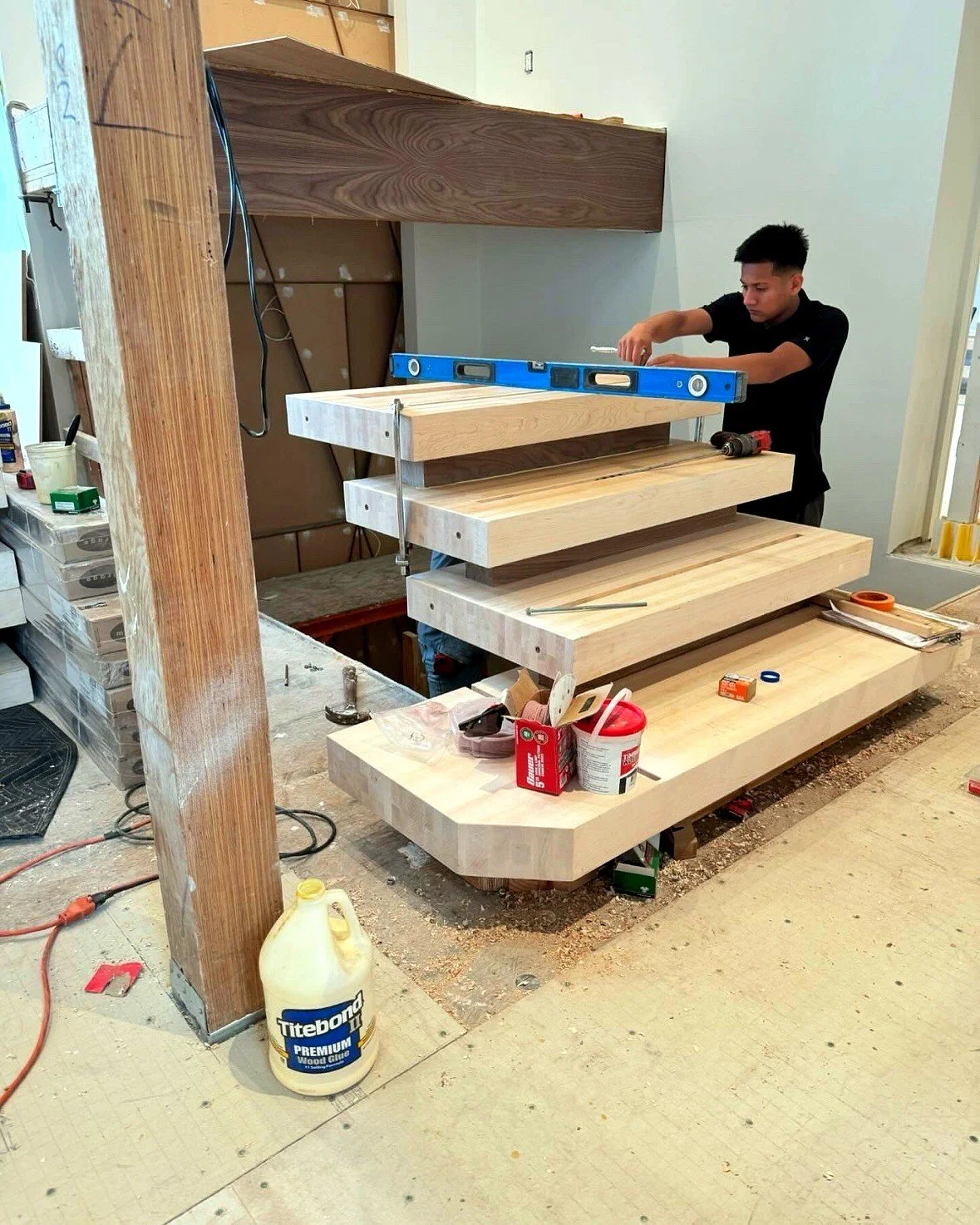 The Blockley stacked-block staircase during installation, leveling the stack