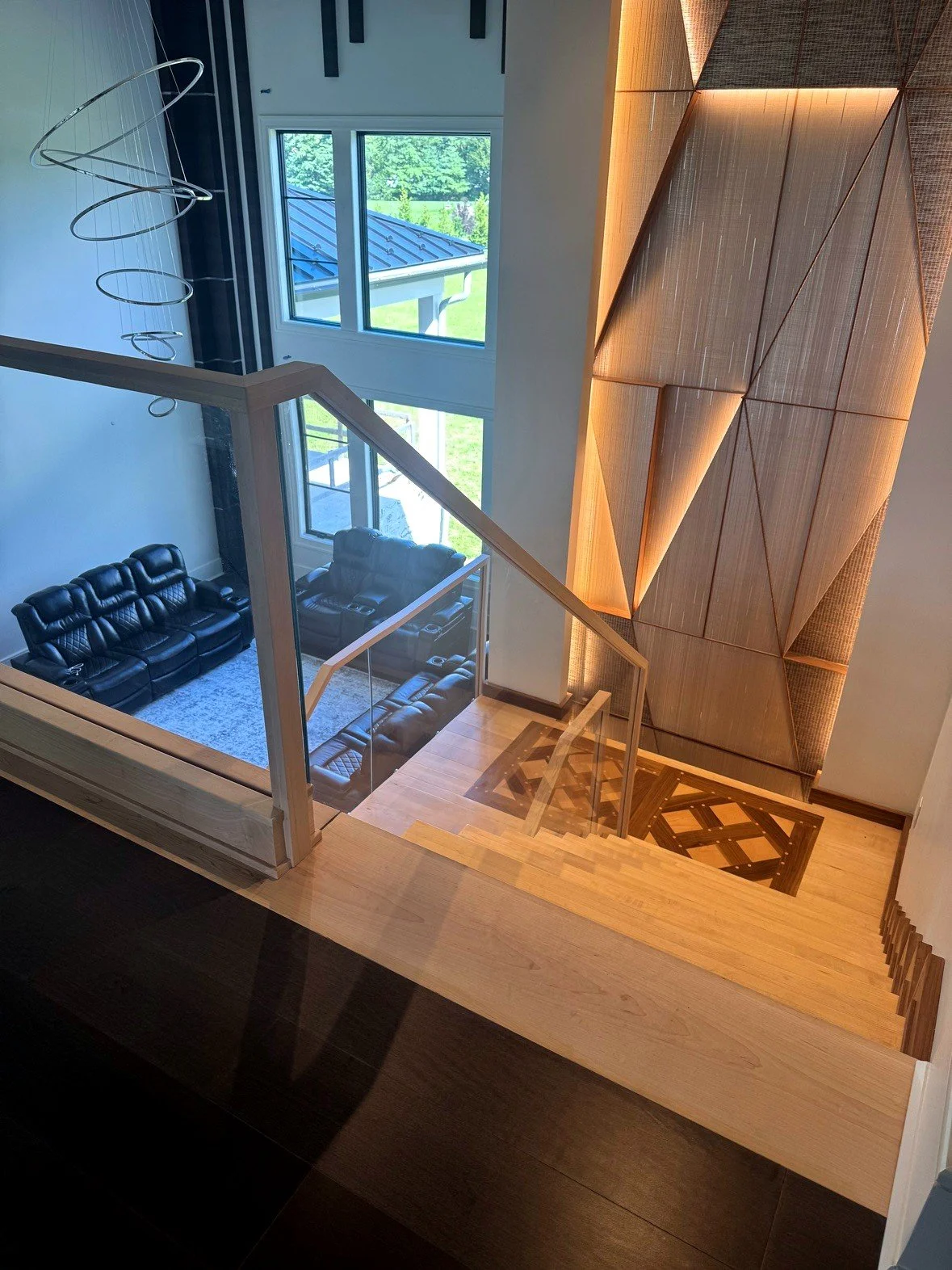 Straight floating stair with frameless glass railing