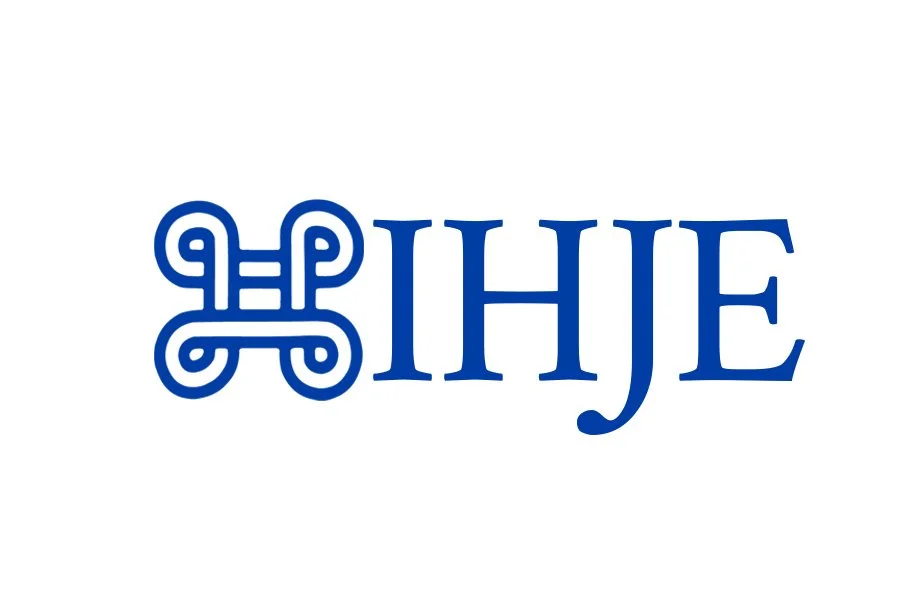 A blue Harry Potter-style logo with a decorative butterfly symbol, followed by the reversed text 'IHE'.