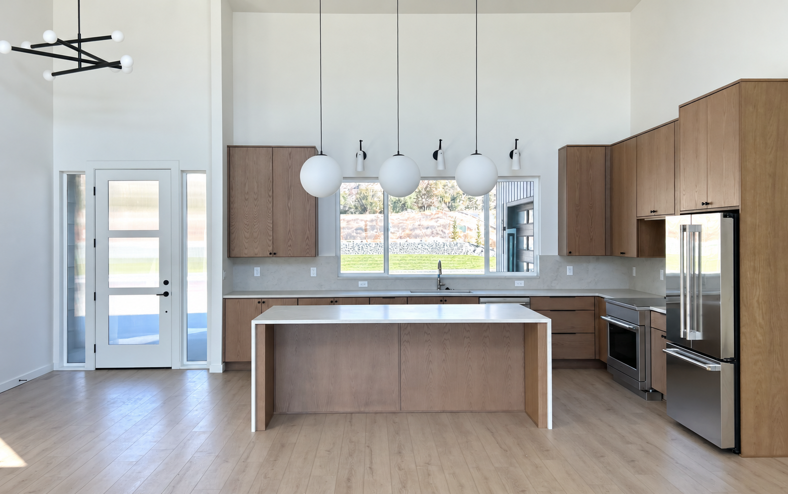 Clean kitchen with clear window view.png
