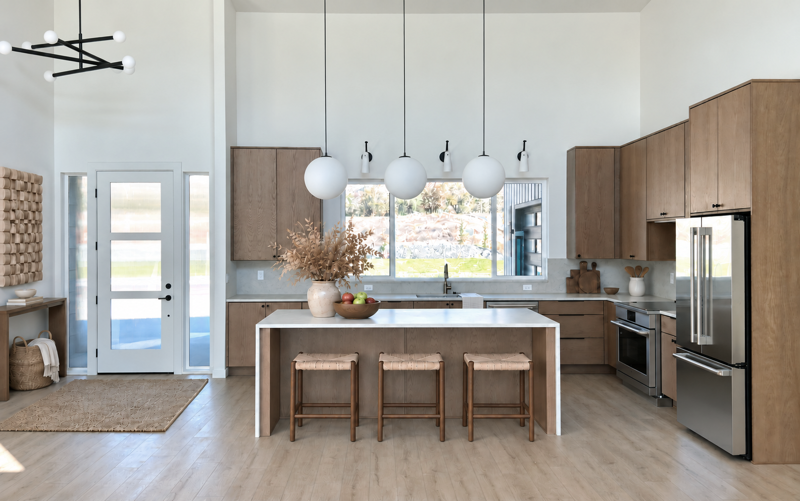 Polished kitchen with apples and wooden stools.png