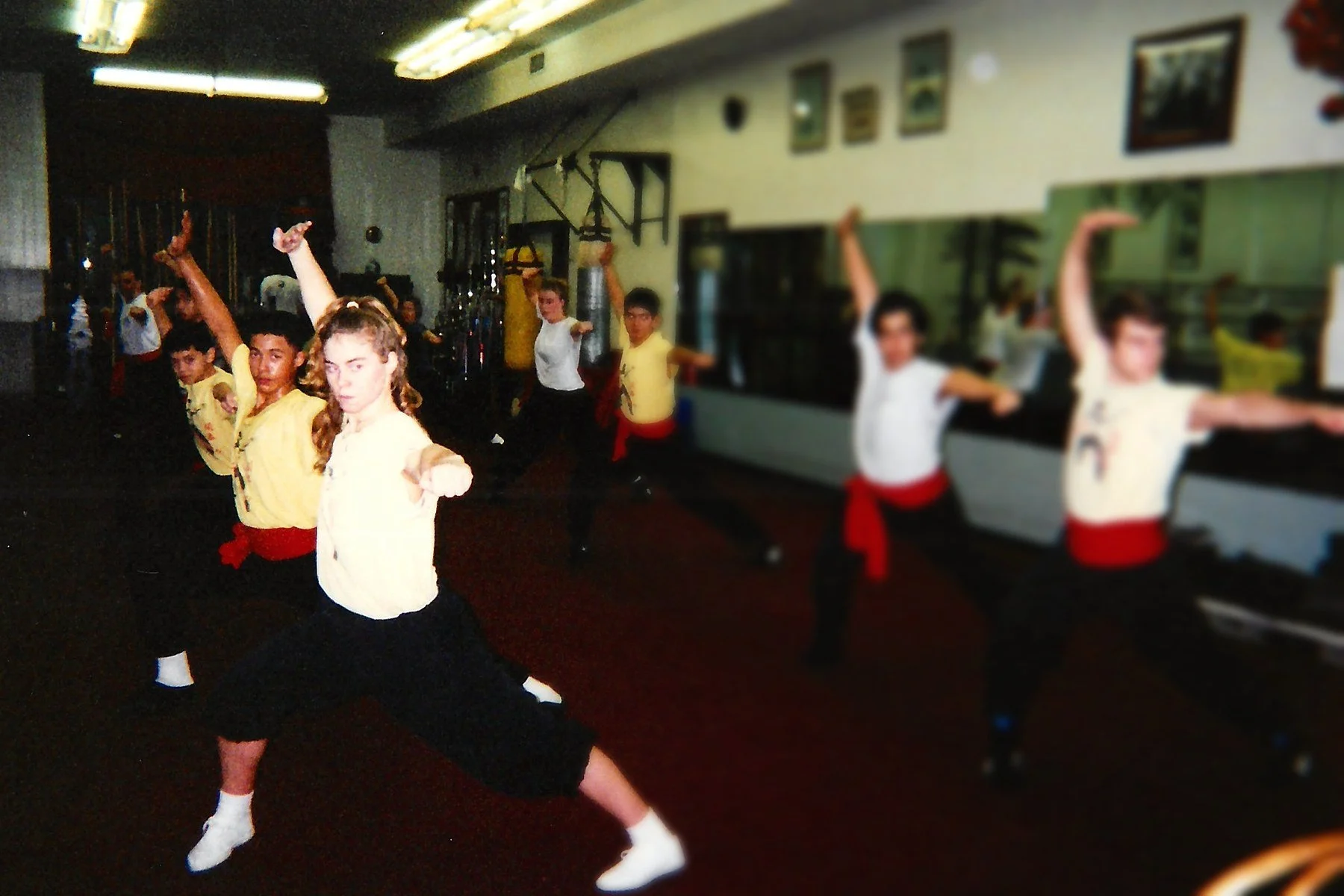 James Whitley III as a teenager training a Hung Fut form with his classmates at Sifu Tai Yim's kung fu school