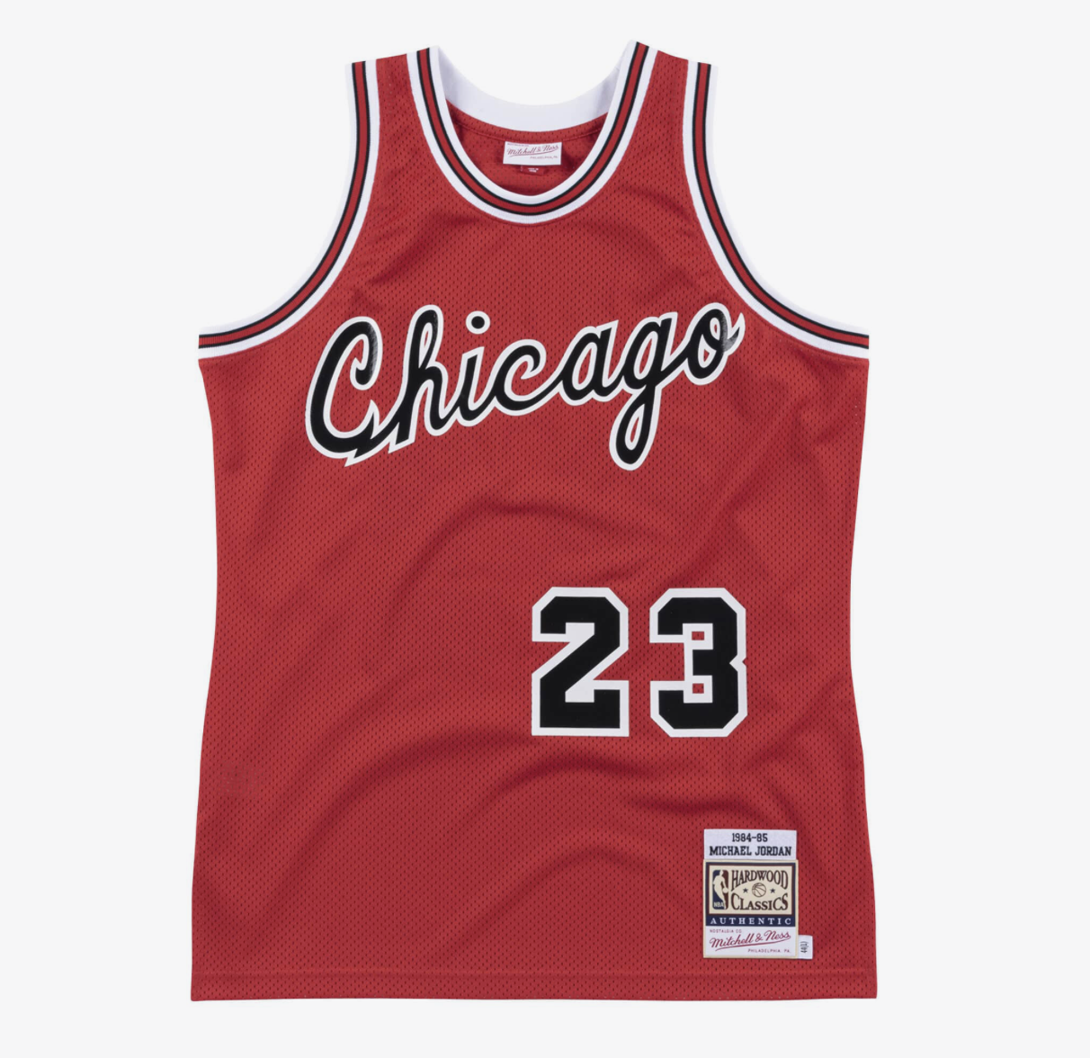 Red Chicago basketball jersey with white, black, and red striped trim, featuring the number 23 and the word 'Chicago' in script across the chest.