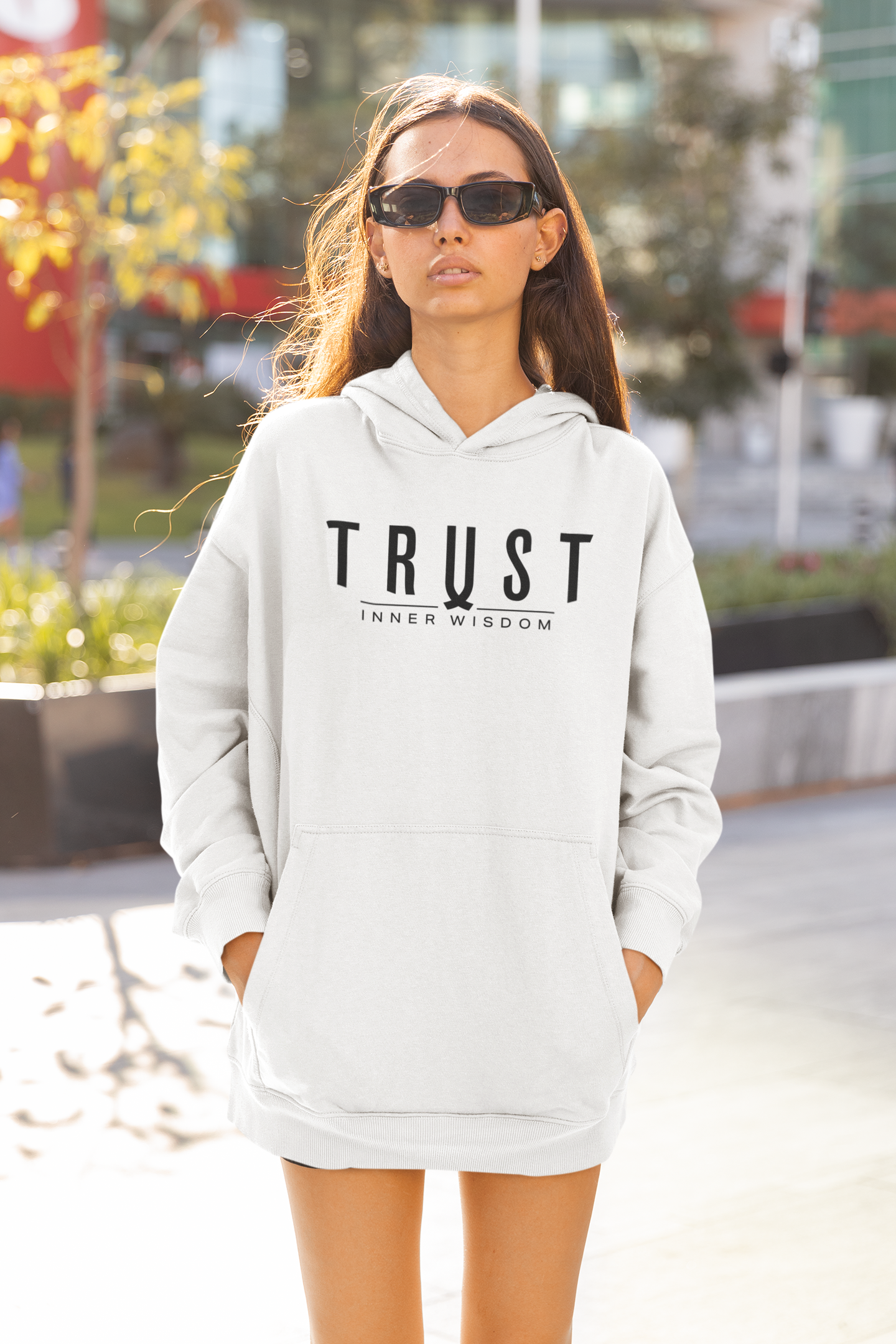 mockup-of-a-tall-woman-wearing-an-oversized-hoodie-and-sunglasses-on-the-street-m25312.png