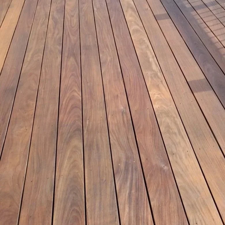 Close-up of a wooden deck with parallel brown planks and visible wood grain