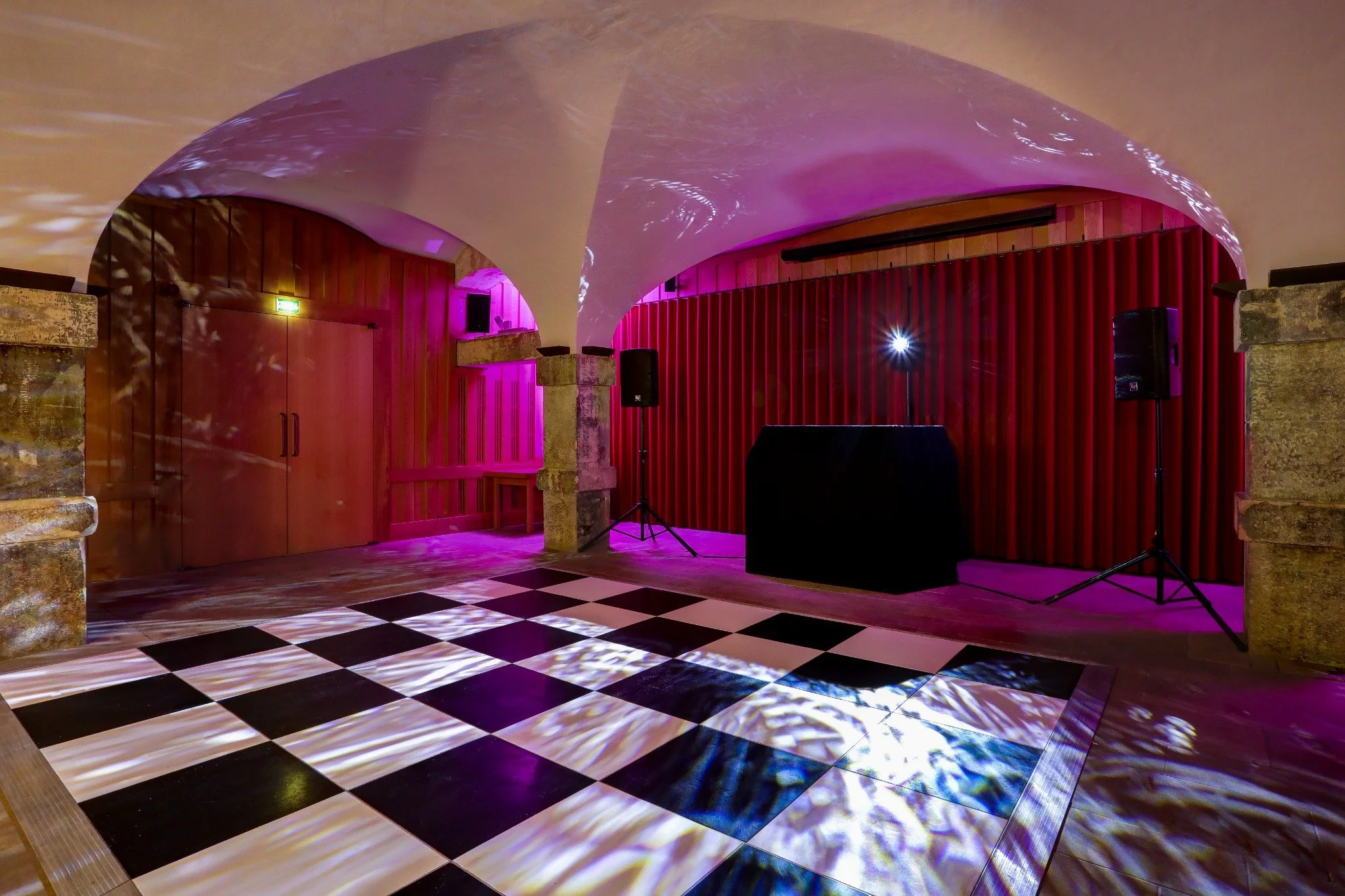DJ and dance-floor layout for an evening celebration in the Crypt.