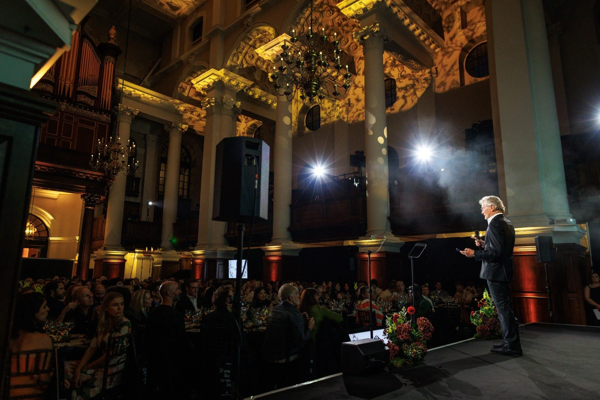 Speaker presenting to an audience at the D&AD Awards in the Nave