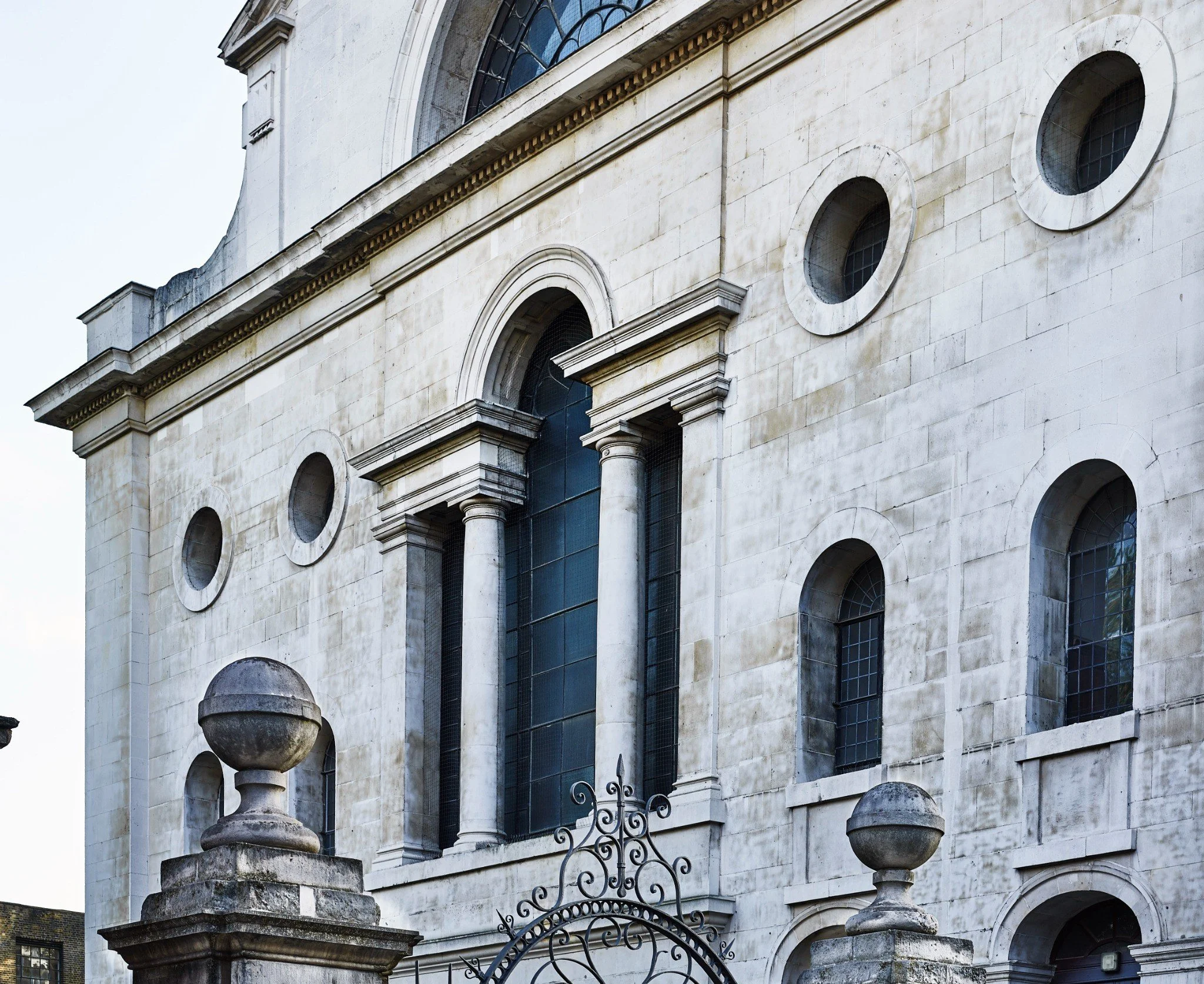 Stone façade, windows and entrance details at Christ Church Spitalfields.