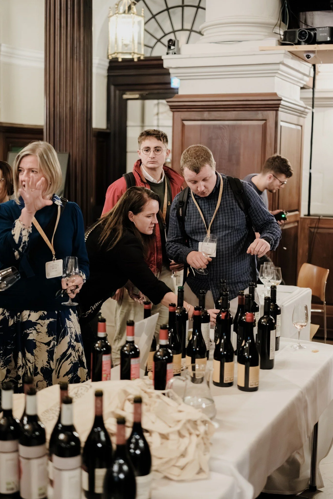 Guests exploring the Sustainability in Drinks exhibition at Christ Church Spitalfields.
