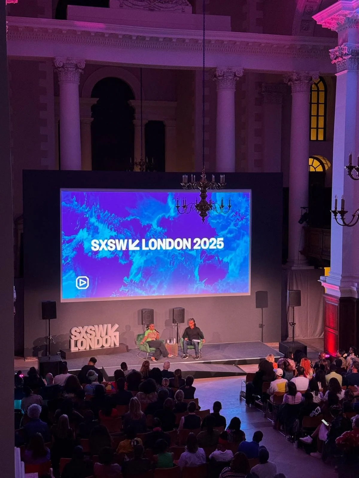 Live talk in the Nave at Christ Church Spitalfields, with a seated audience.