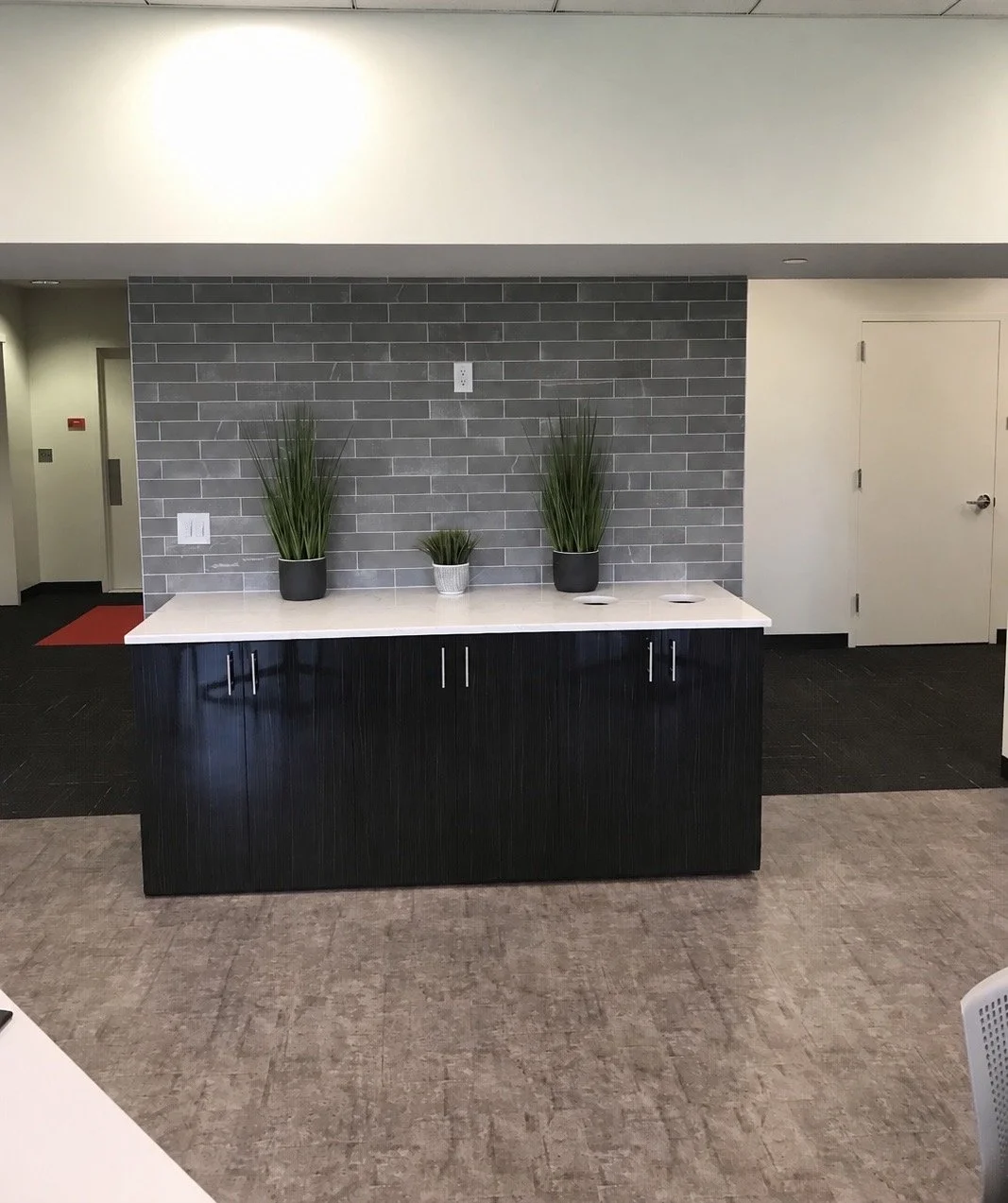 Corporate pantry with custom Cabinetry and brick feature wall, New Jersey