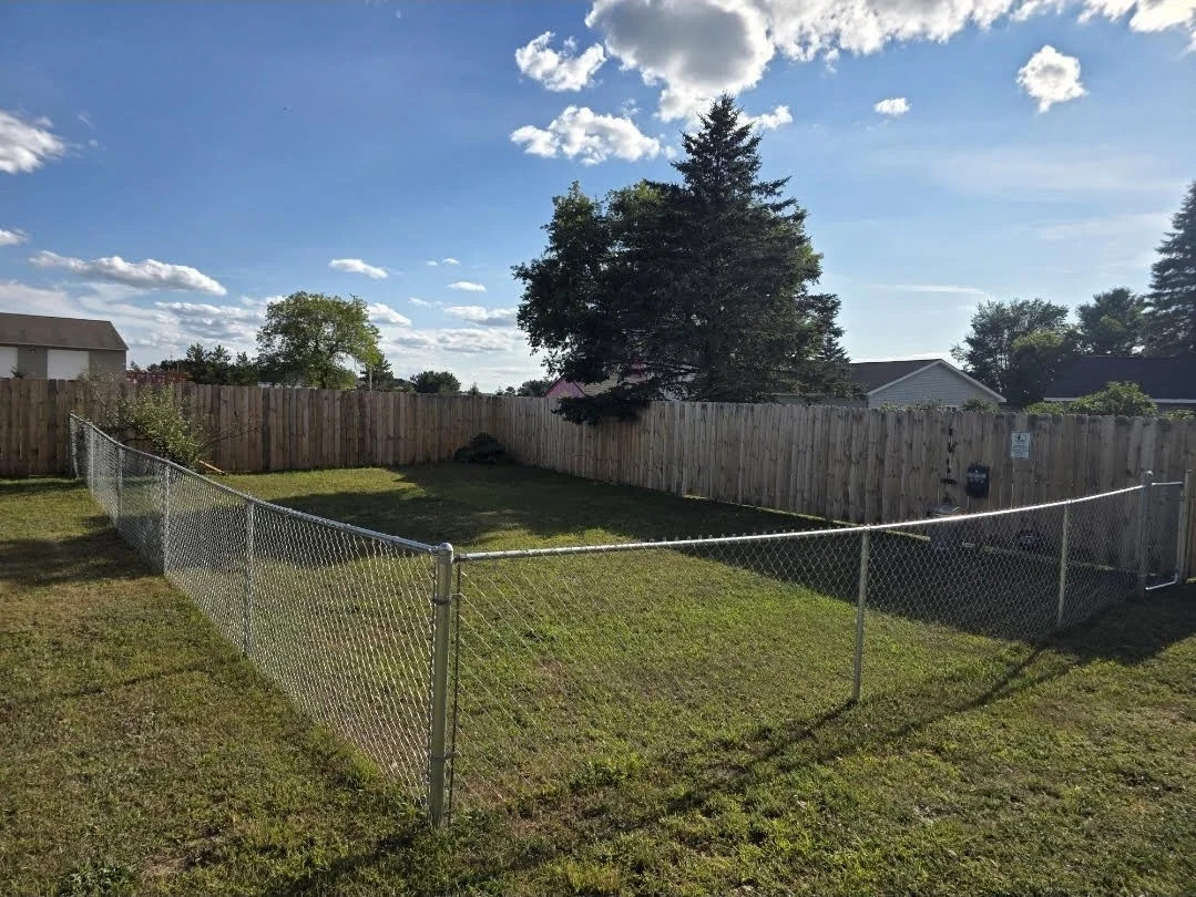 Dog run at Torch & Timber Campground