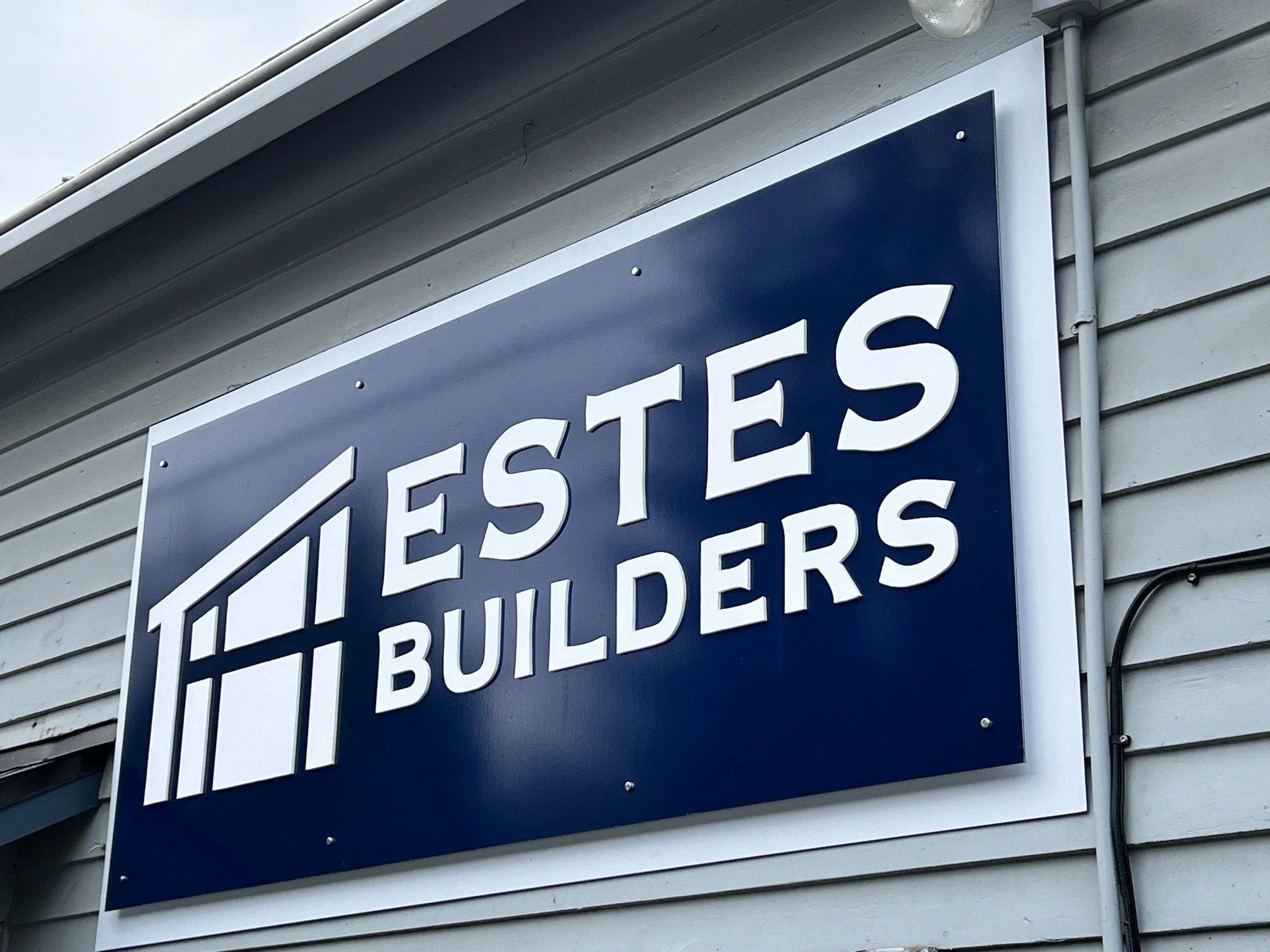 3 dimensional sign with standoffs and raised lettering.  