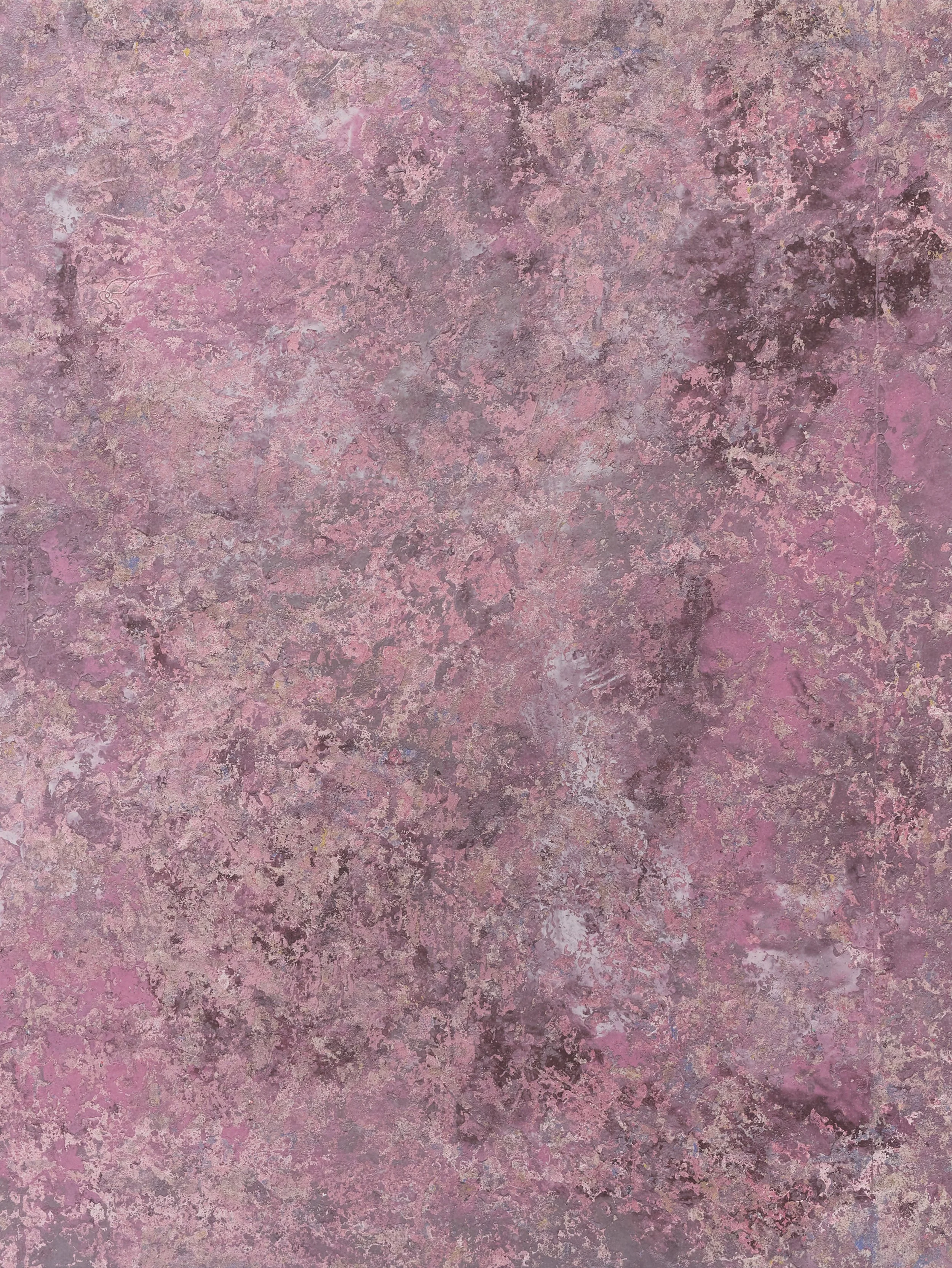 Abstract textured surface in mottled shades of pink, mauve, purple, and gray