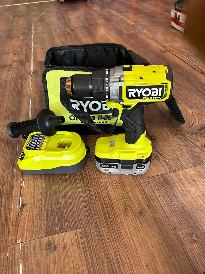Ryobi One HP 18v Ryobi Hammer drill with 4.0 battery and charger.