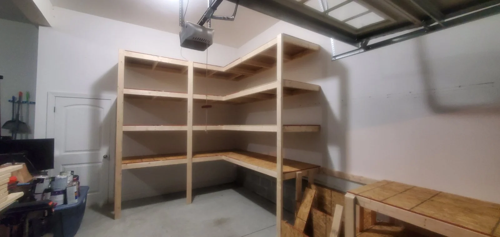 Sturdy garage shelves give tools, bins, 
