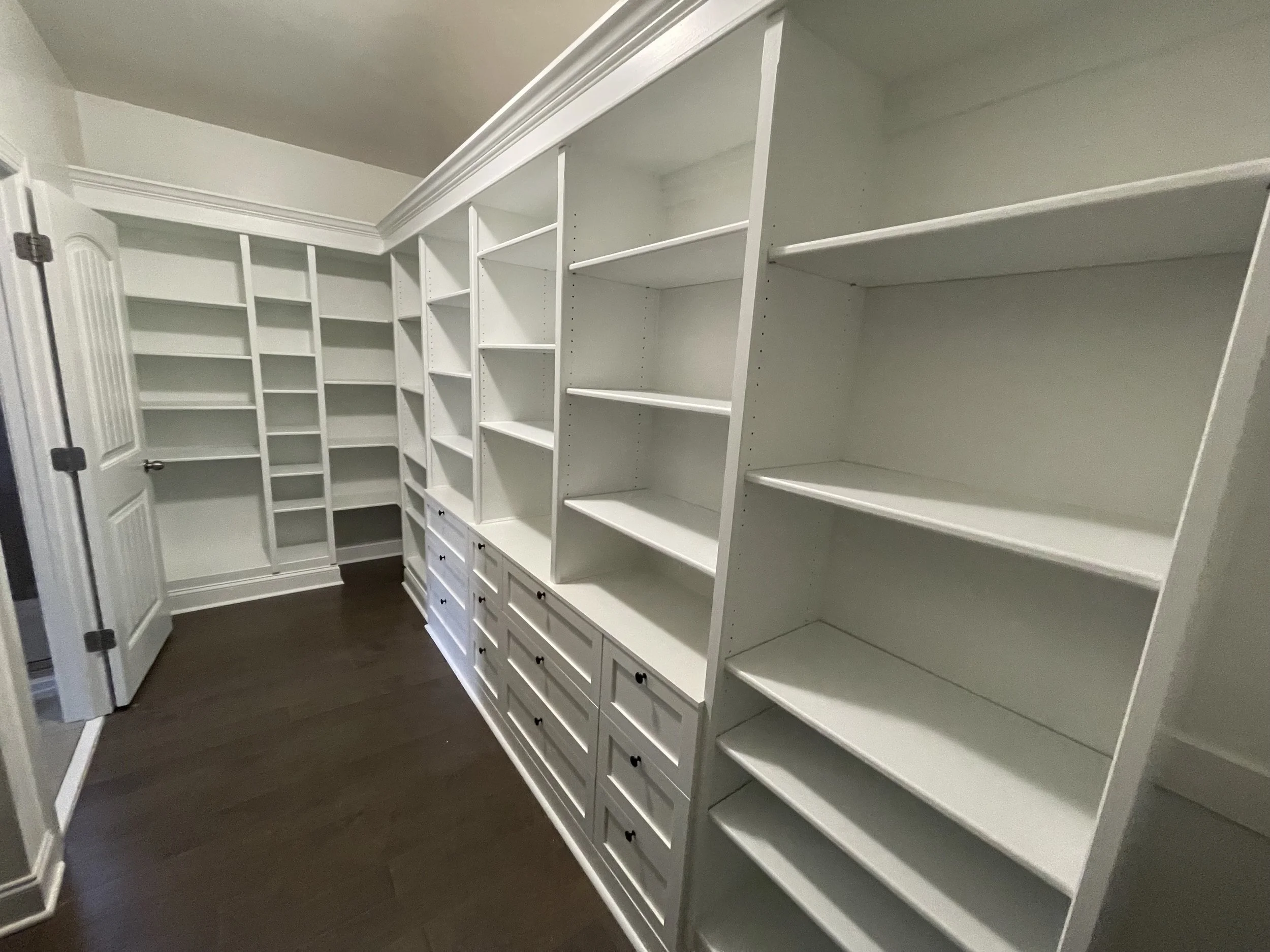 A place for everything makes mornings a little easier. Built-in shelves and drawers keep this closet organized and easy to use.