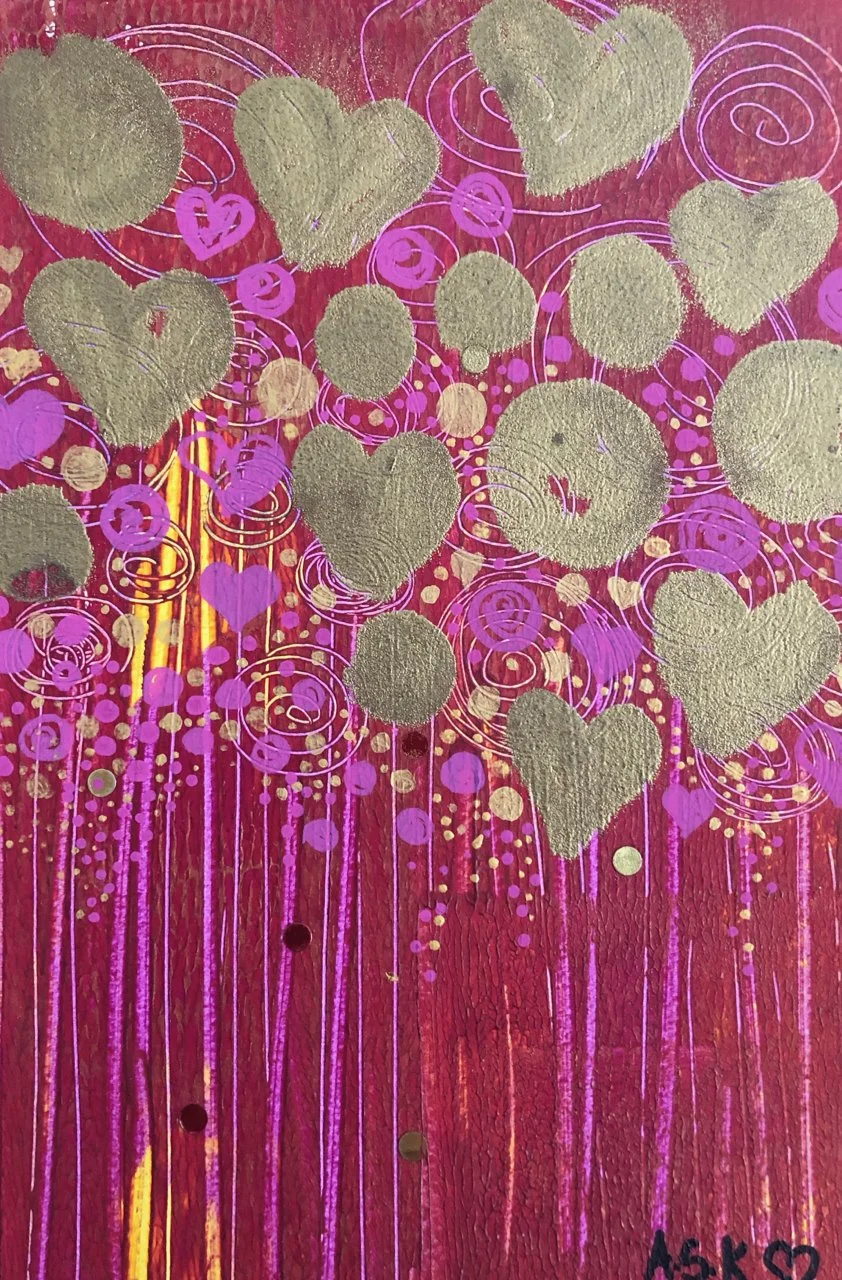 Abstract mixed media painting featuring numerous gold hearts and circles atop a textured red and pink background, with purple and yellow spiral and dot patterns and vertical streaks.