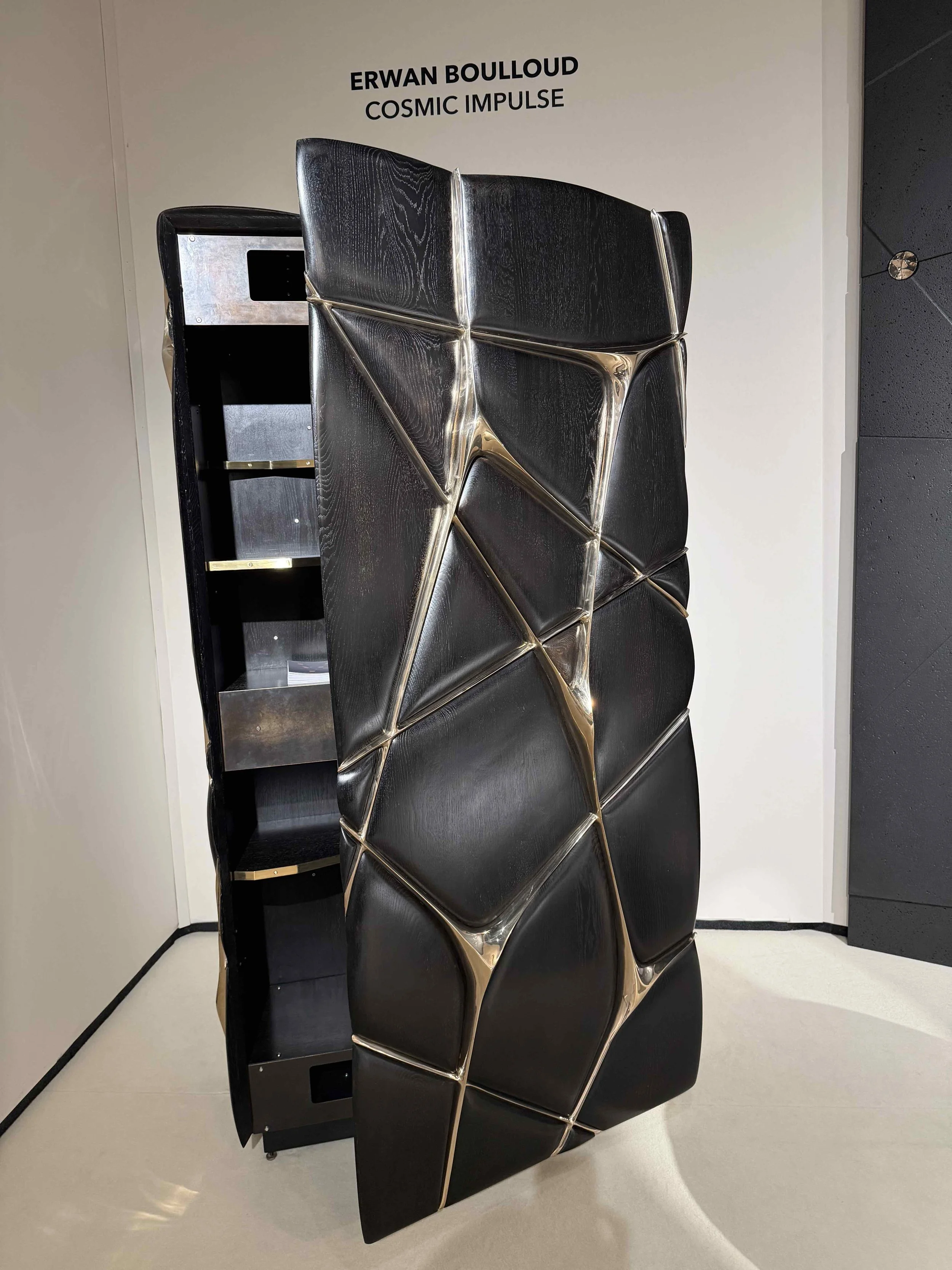 Erwan Boulloud’s black sculptural Cosmic Impulse cabinet displayed at PAD London.