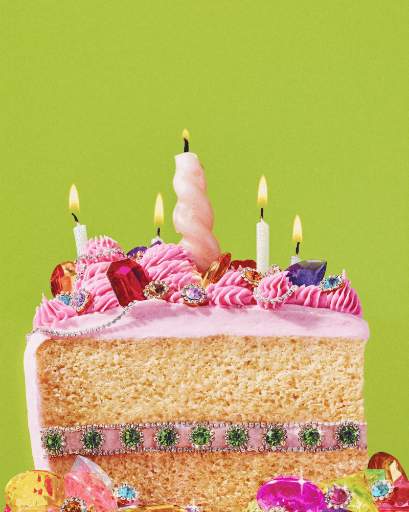 Colourful birthday cake slice with pink icing, candles and decorative sweets against a lime green background.