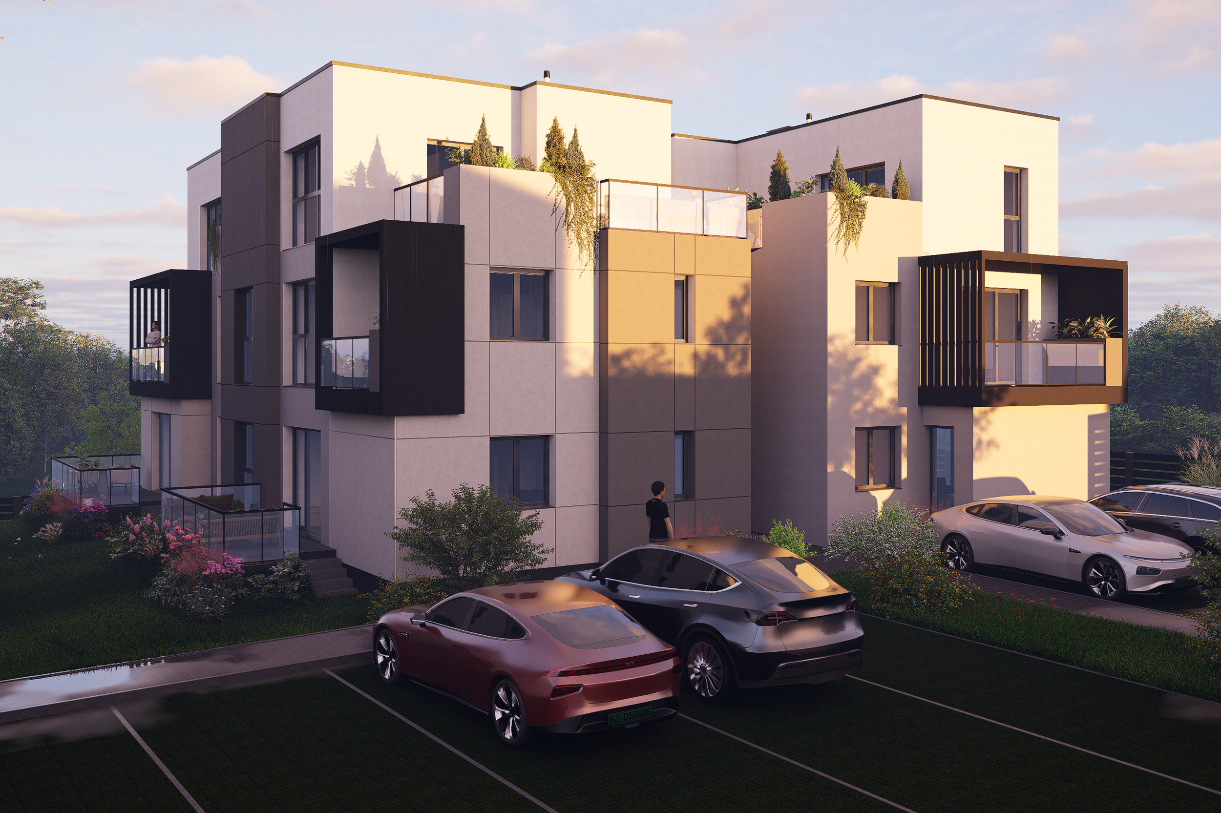 Modern multi-story apartment building with balconies, some with plants, and a rooftop garden, surrounded by parked cars and greenery, during sunset.