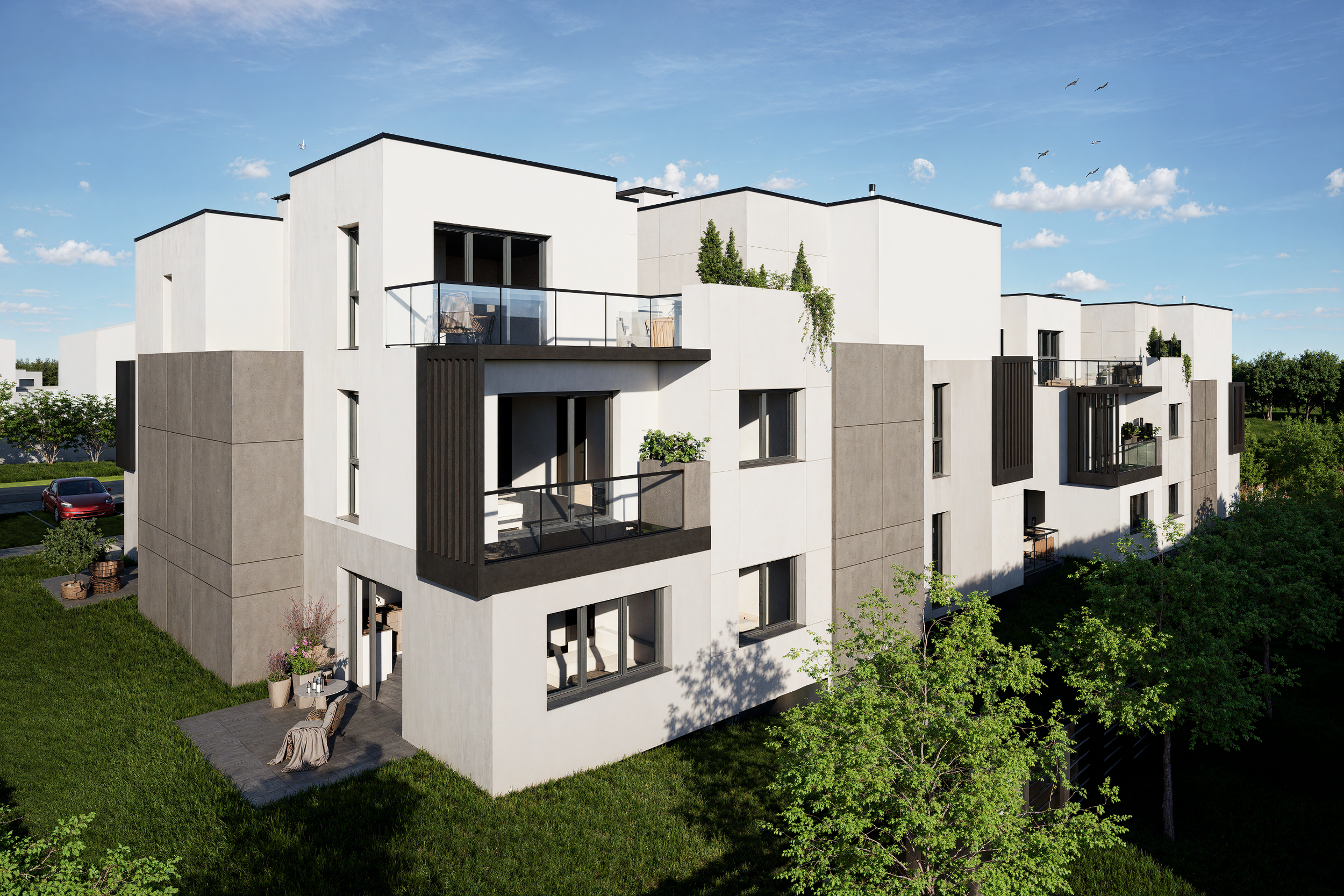 Modern white multi-story apartment building with black accents, balconies with glass railings, and greenery on some balconies, set against a blue sky with clouds and birds flying.