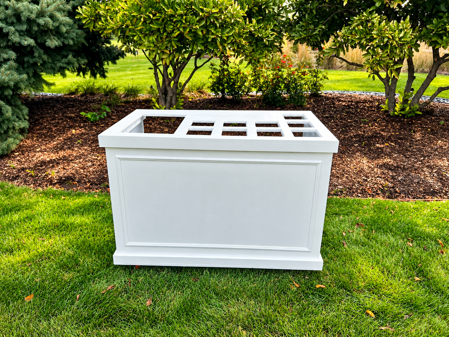 White Grid-Top Planter in a Sunny Garden.png