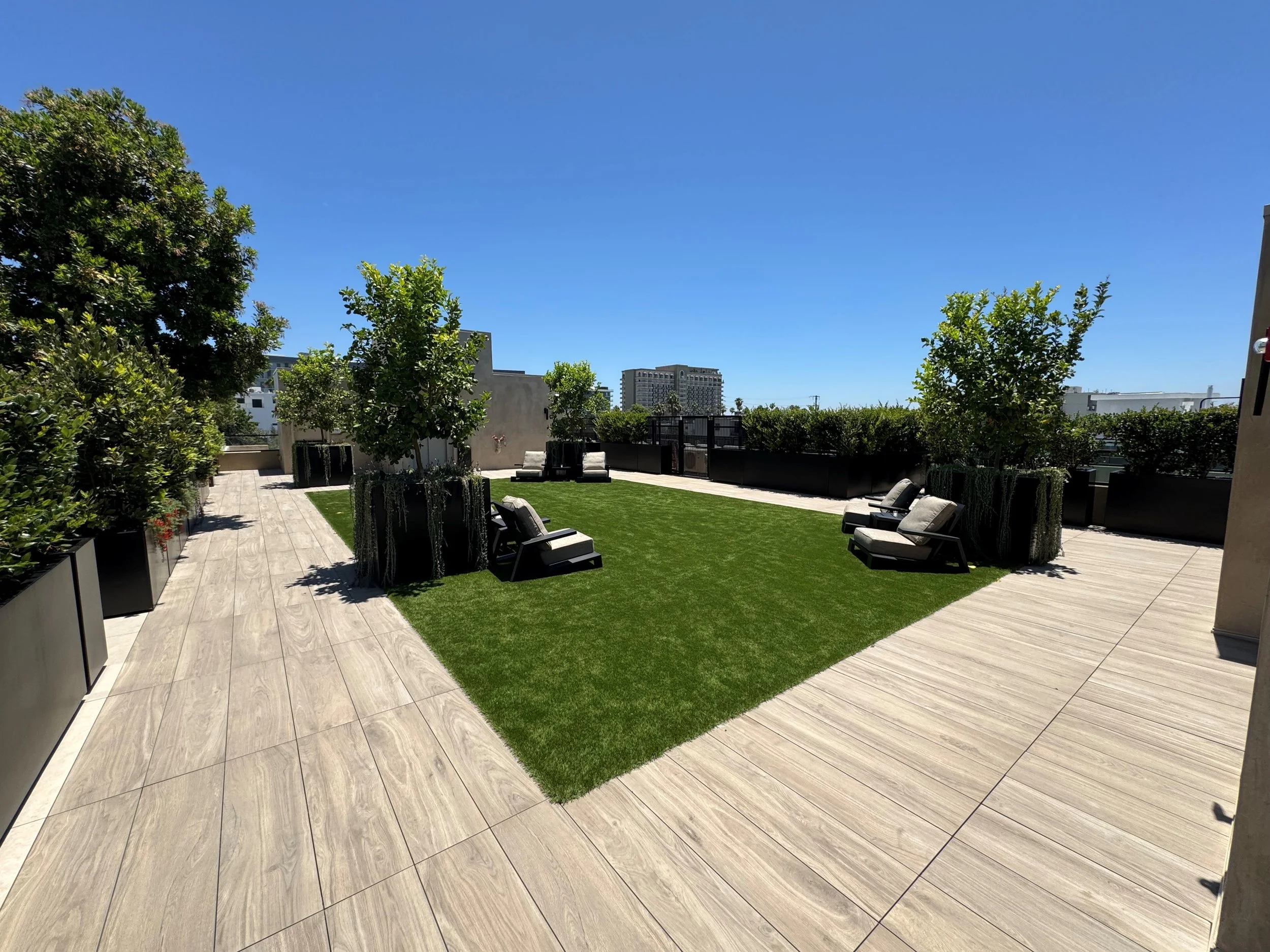 Belgard, 2cm 12"x 48" Porcelain, AGL Turf Over Fiber Grates & Bison Pedestal System