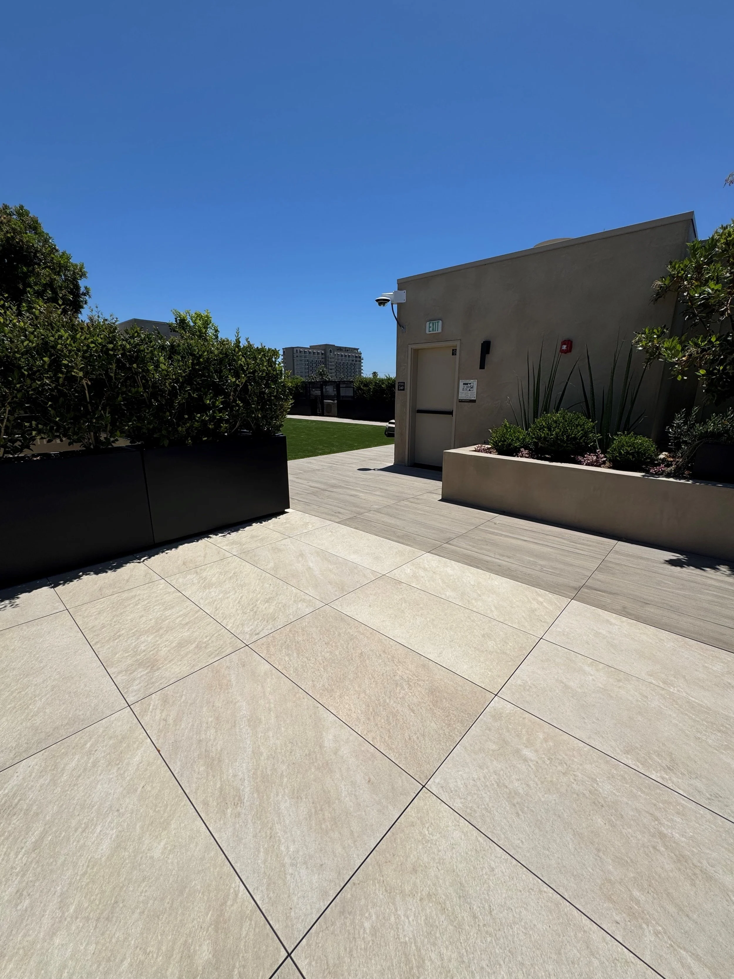 Belgard, 2cm 12"x 48" / 24"x 48" Porcelain, AGL Turf Over Fiber Grates & Bison Pedestal System