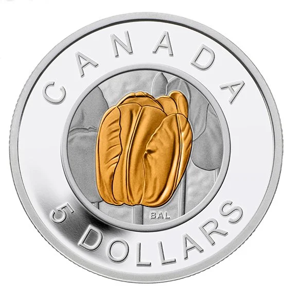 Canadian five-dollar coin featuring a gold baseball glove and the words Canada and 5 dollars designed by Bert Liverance