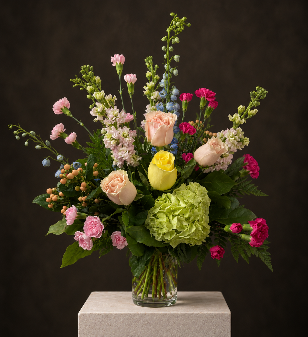 Moody Studio Bouquet on Stone Pedestal.png