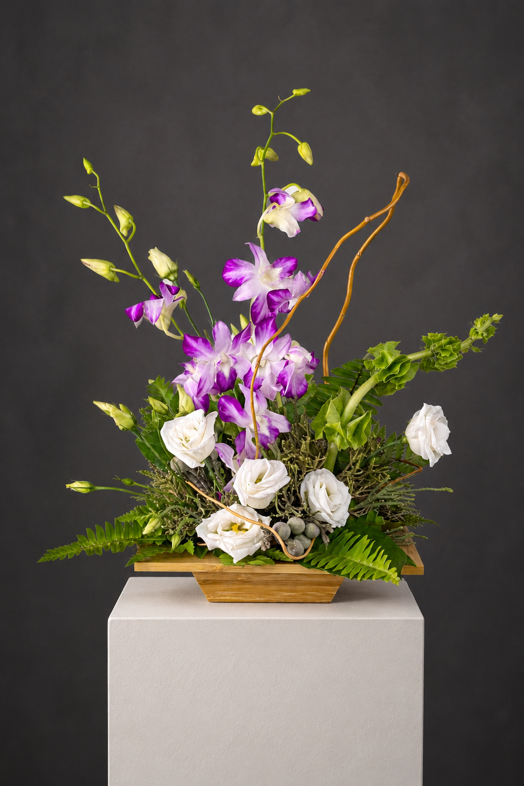 Elegant Orchid and Rose Arrangement.png