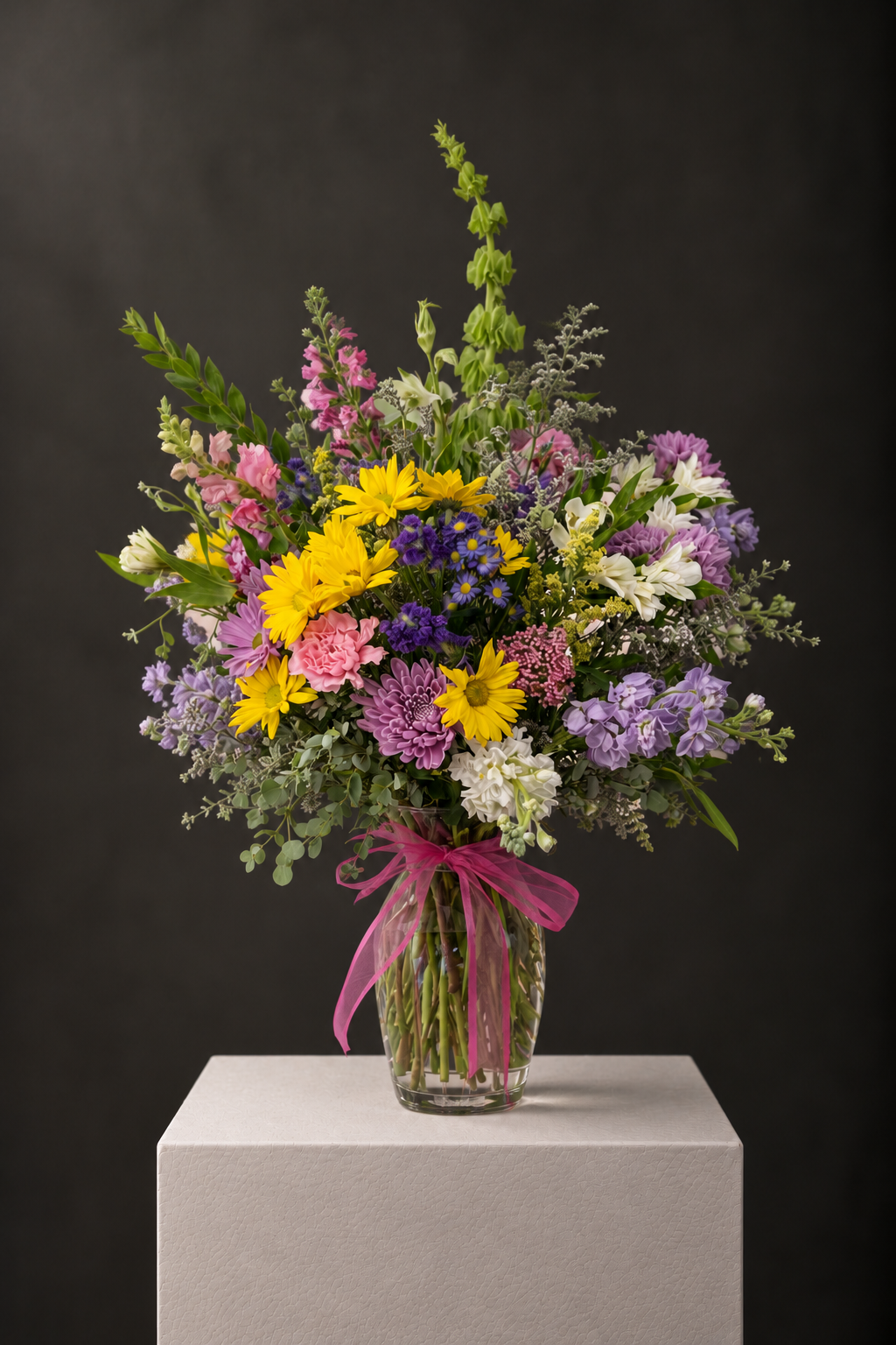 Elegant Wildflower Bouquet on a Textured Plinth.png