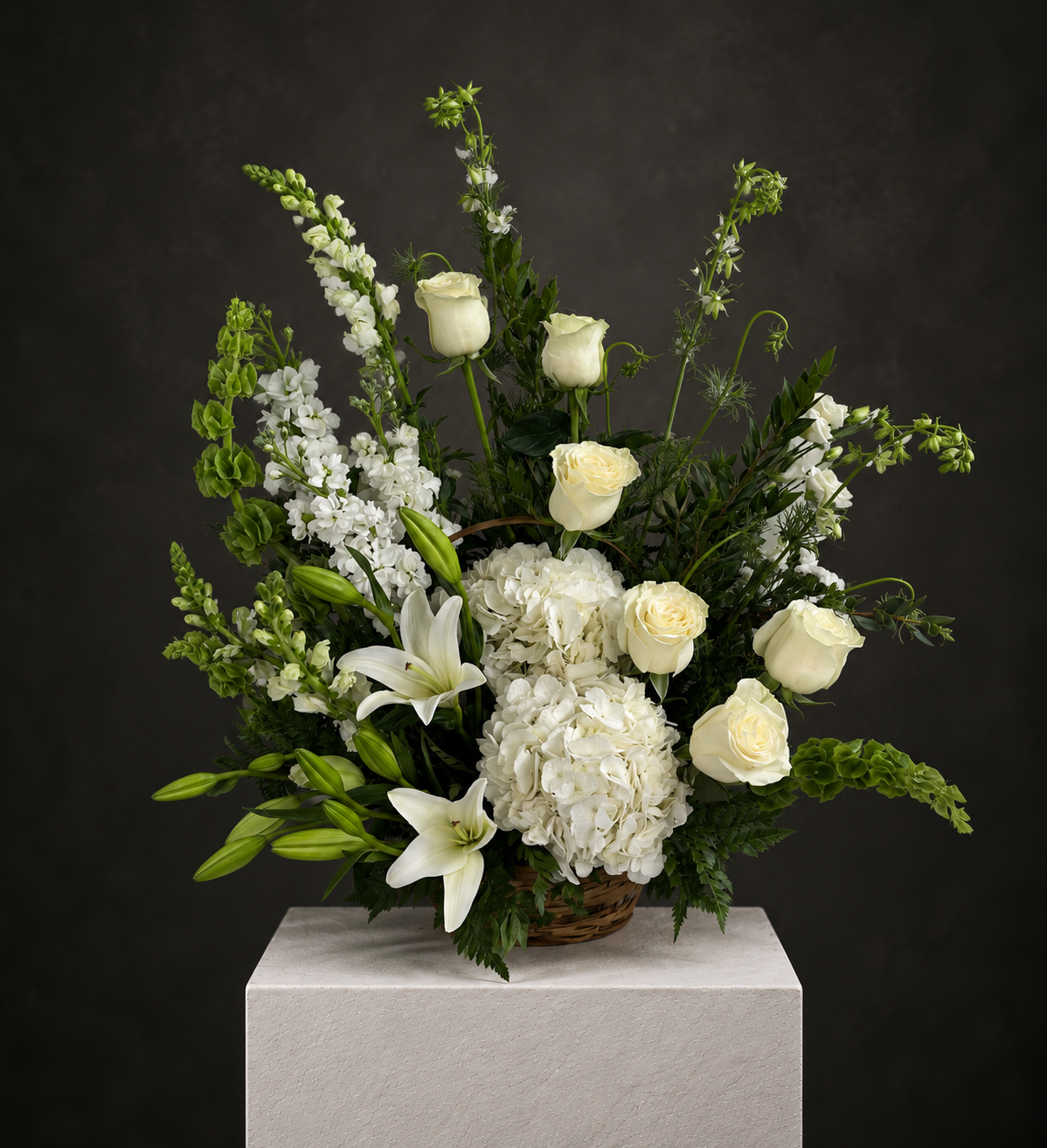 Elegant White and Green Floral Arrangement.png