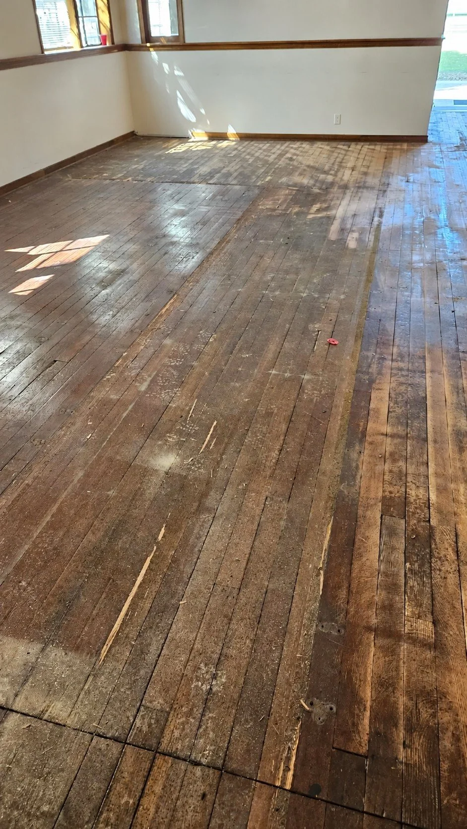 Church hardwood restoration — before sanding.