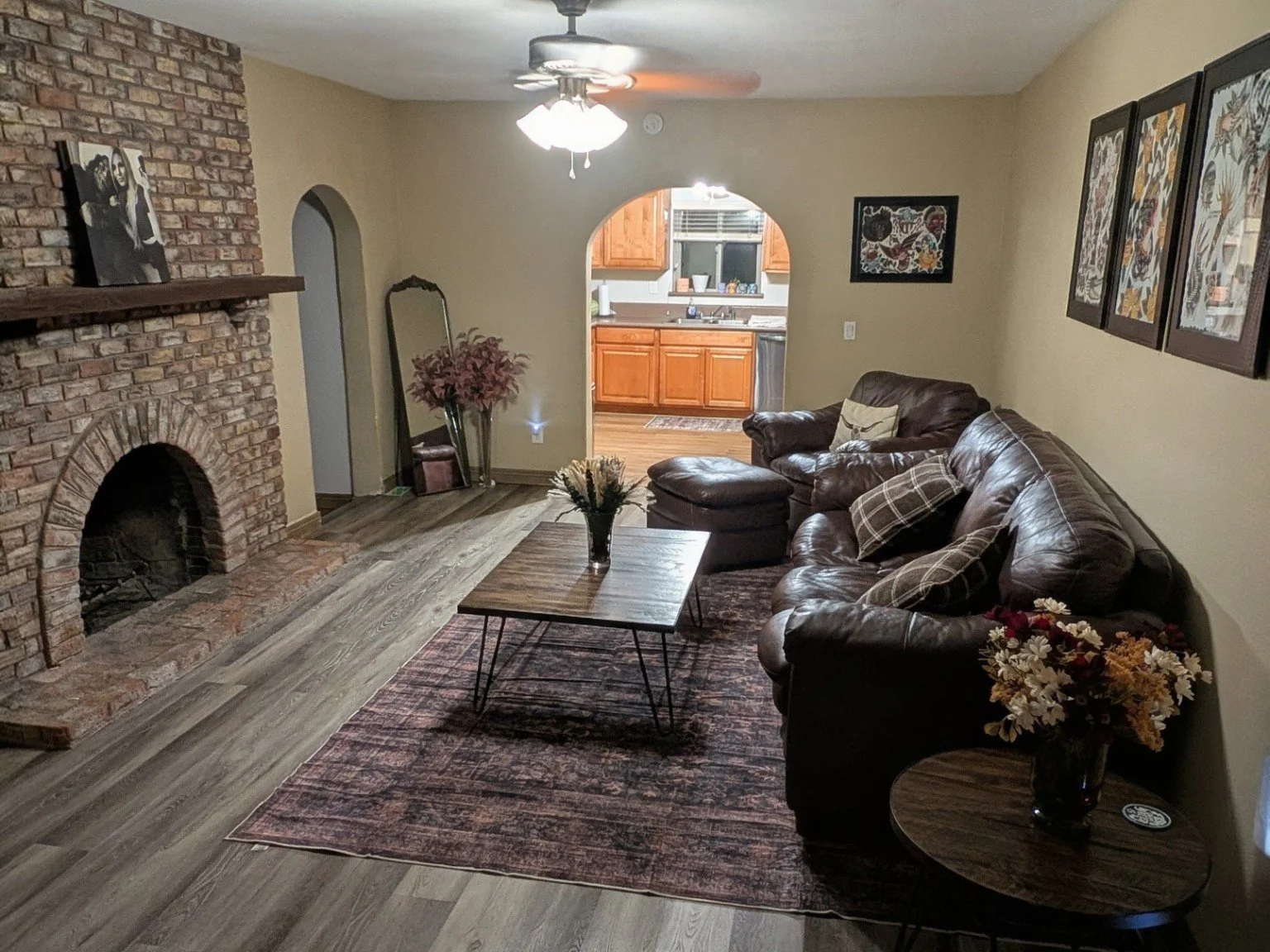 Completed wood flooring in a living room by T&S Design & Flooring.