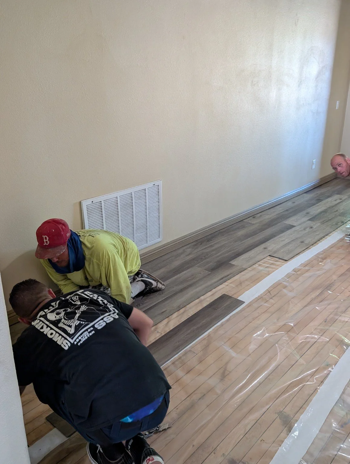 Living-room transformation — installation in progress.