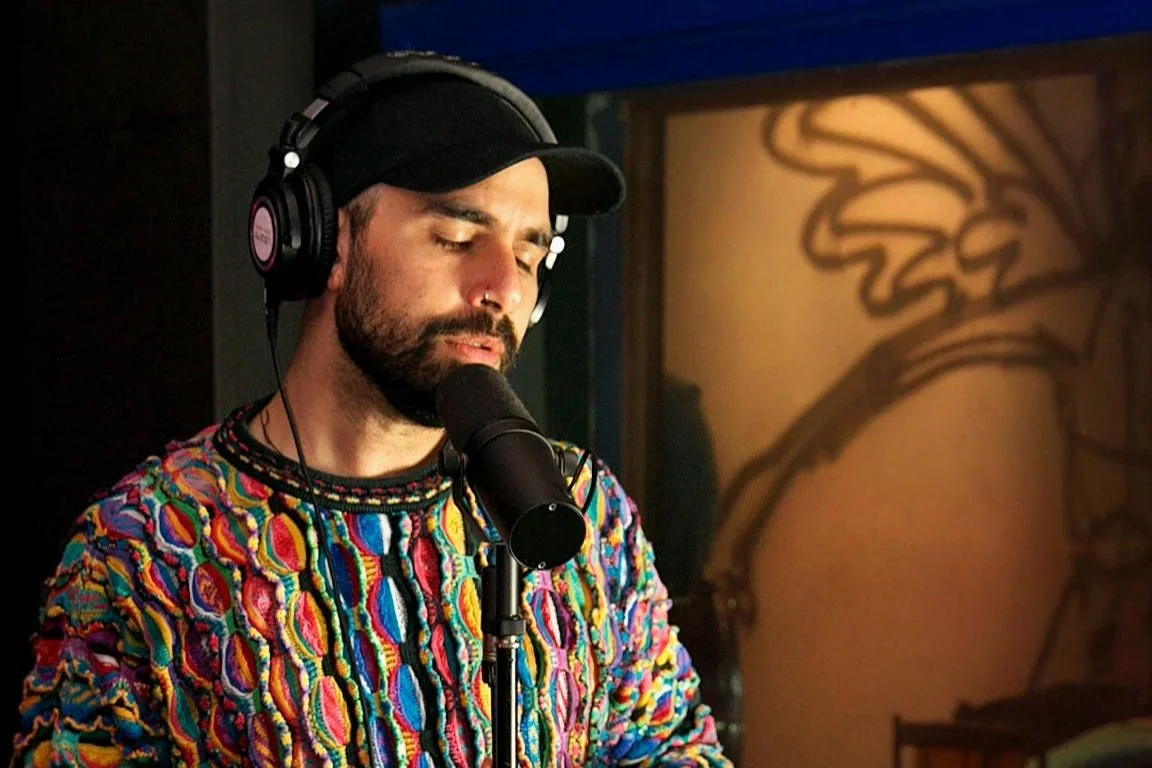 Dan Romeo singing in the studio, Sydney singer, guitarist and producer
