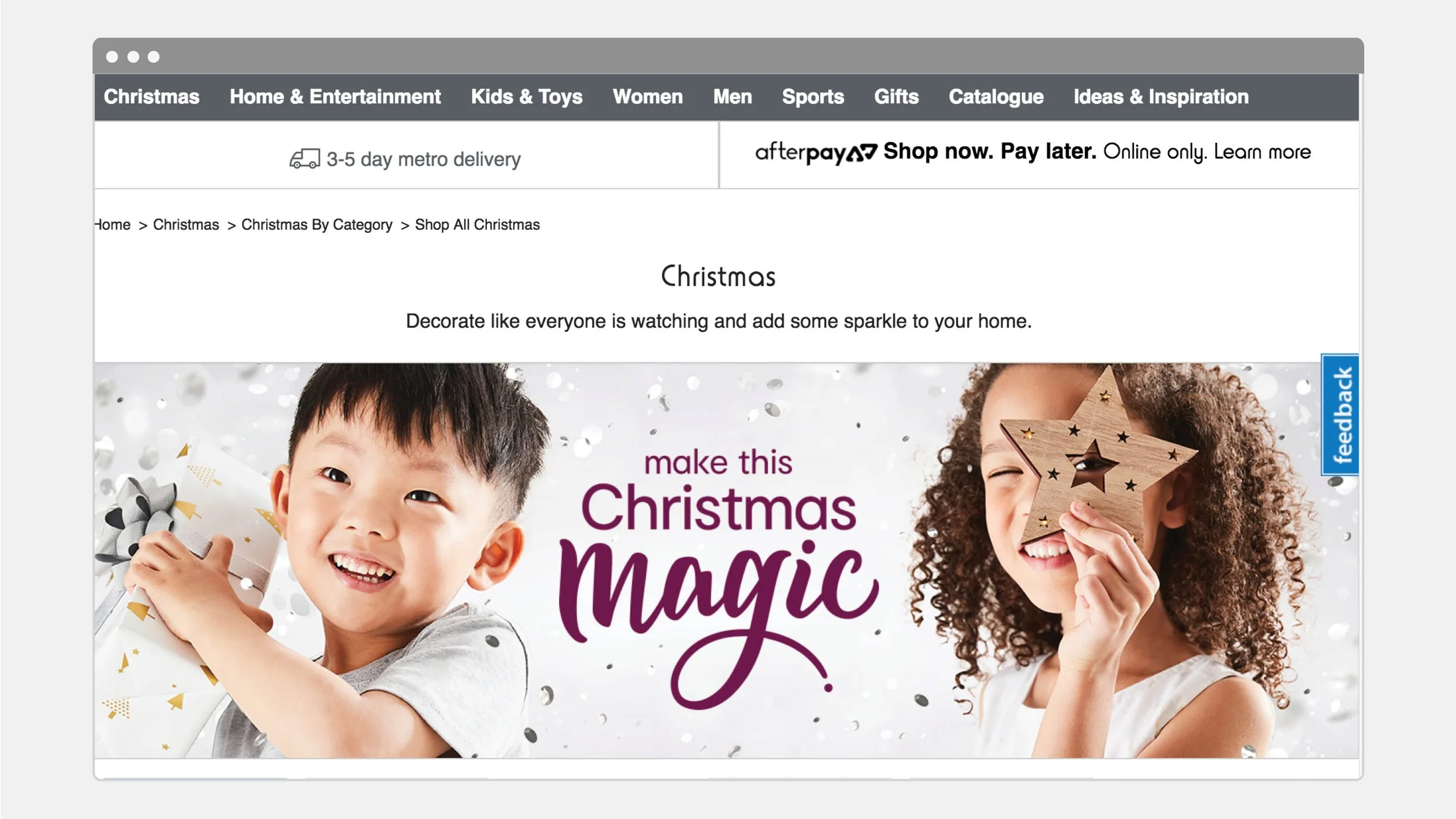 Christmas shopping website banner featuring two children, holiday gifts, and the text “Make this Christmas magic.”