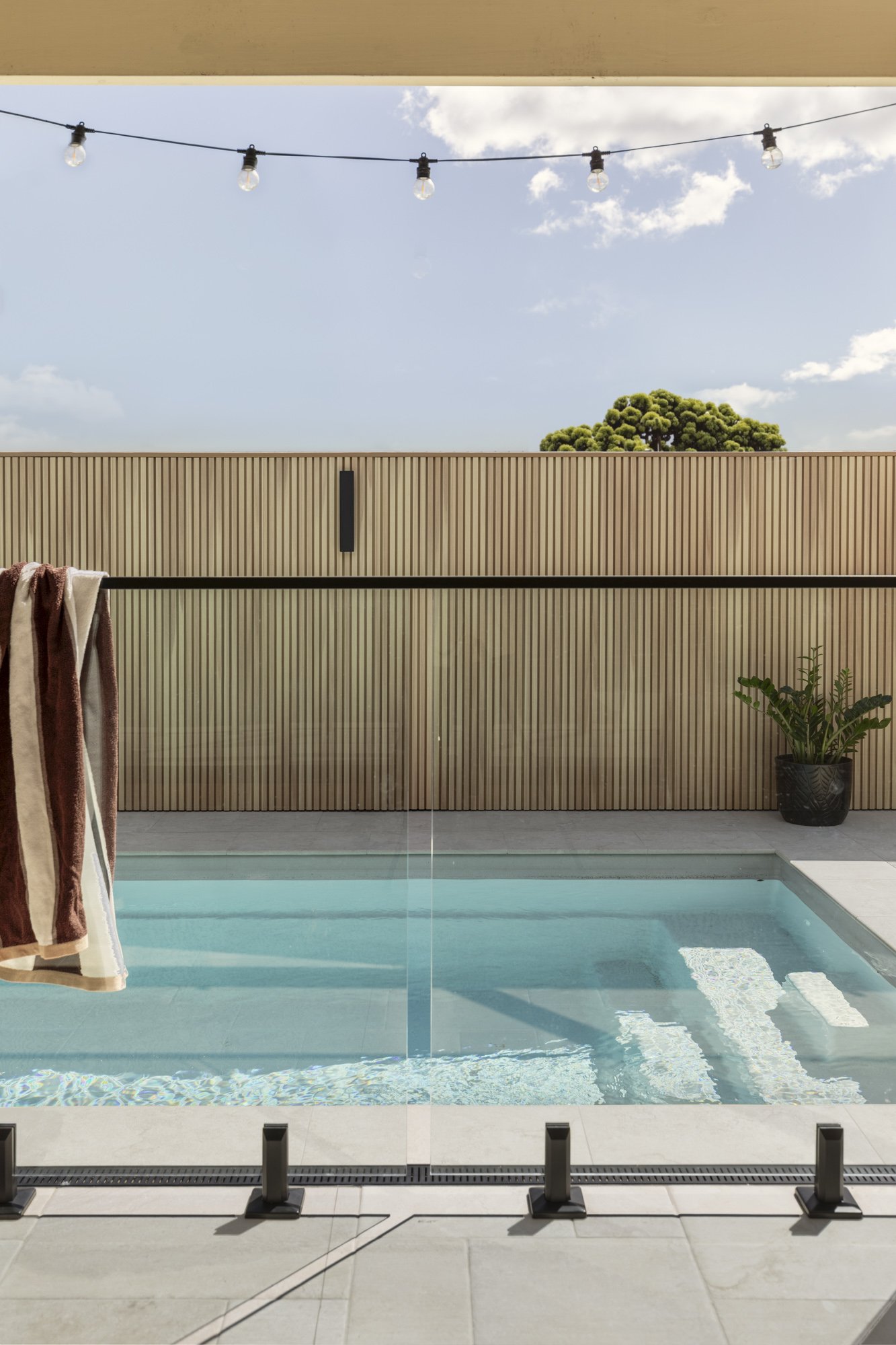 Pool with NewTechWood castellated cladding fence, Albion Park
