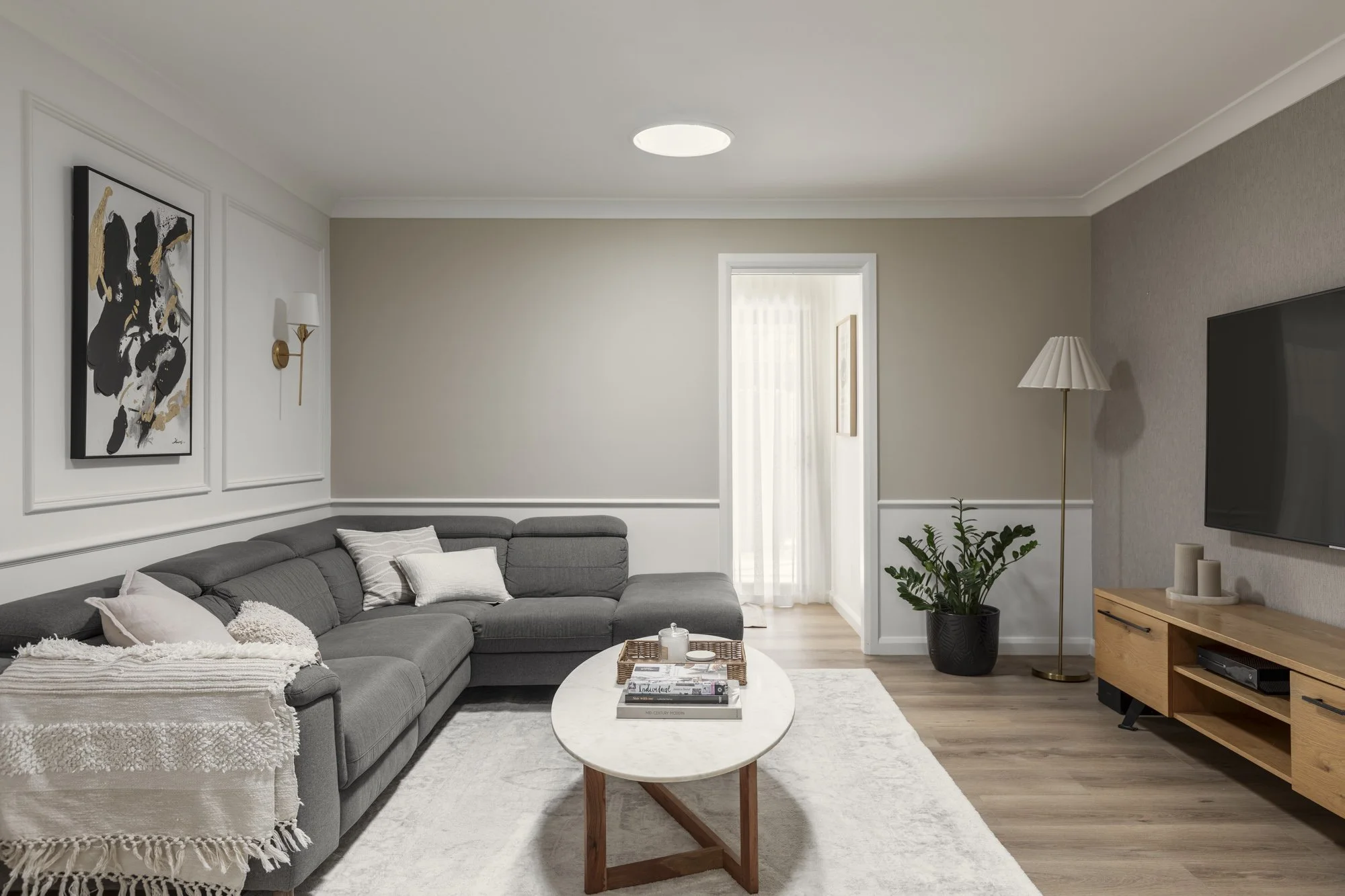 Front living room with custom wall panelling, Albion Park home renovation