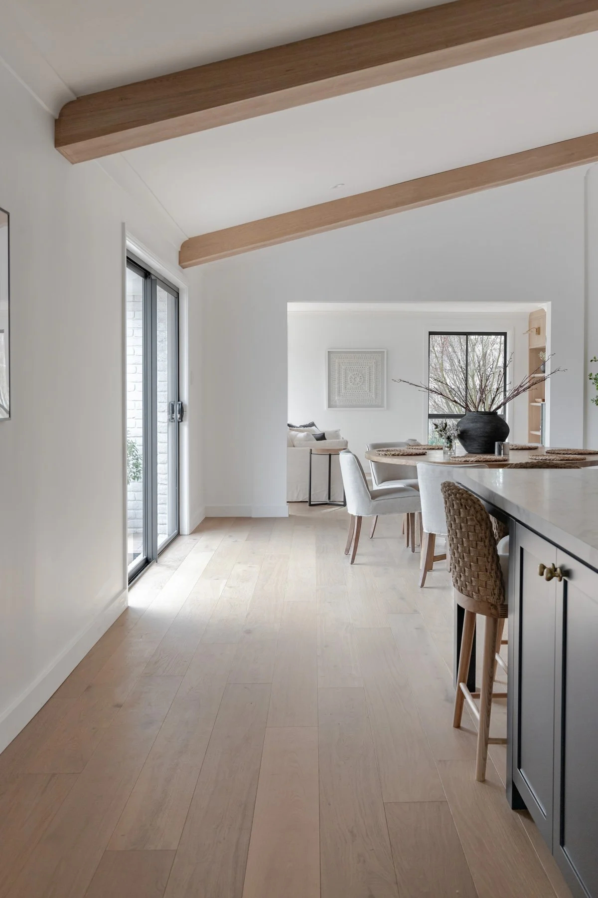 Victorian ash feature beams over the dining area, Bowral country home
