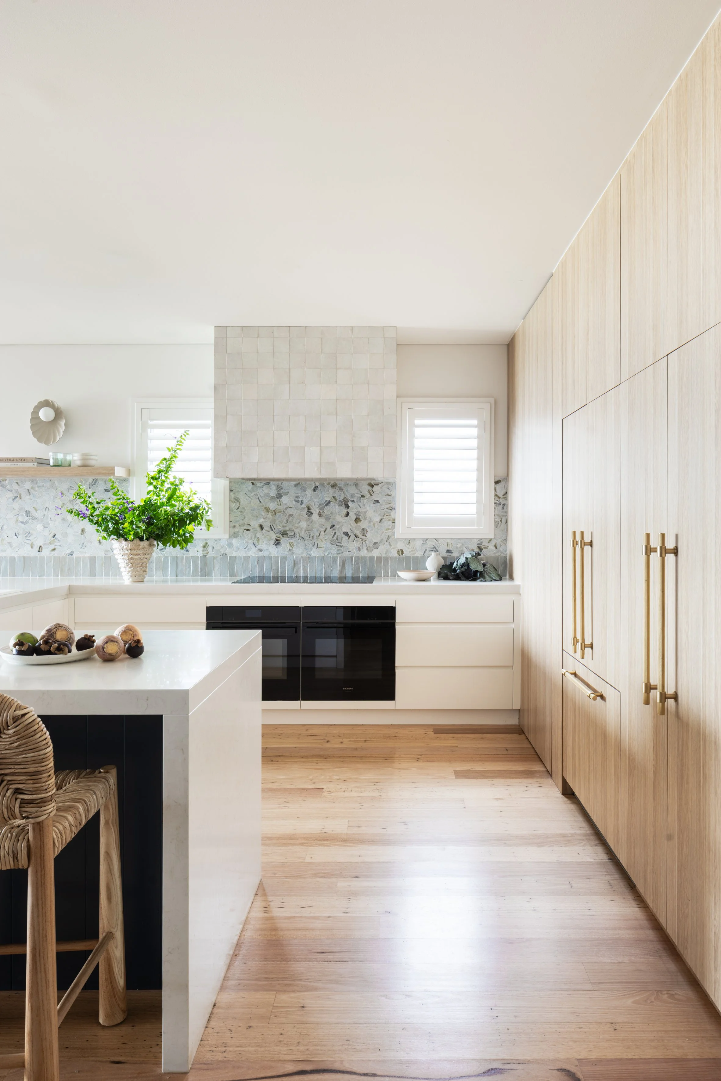 Timber kitchen with handmade tiled rangehood and navy VJ island, Shell Cove
