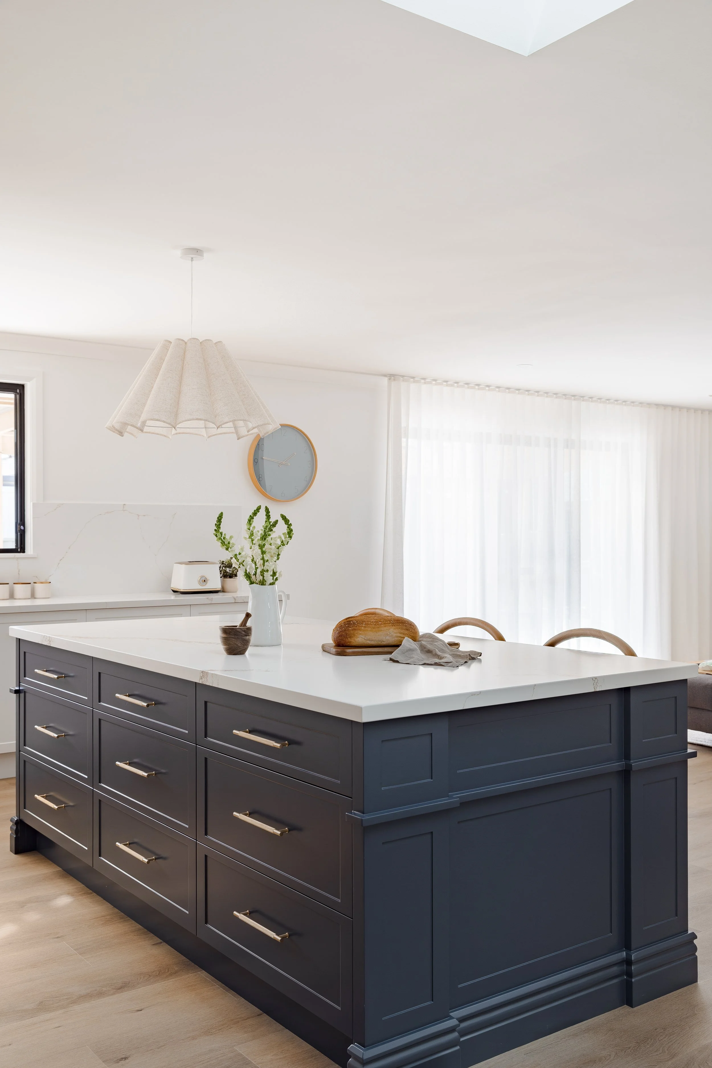 Navy kitchen island beneath new skylights, Albion Park