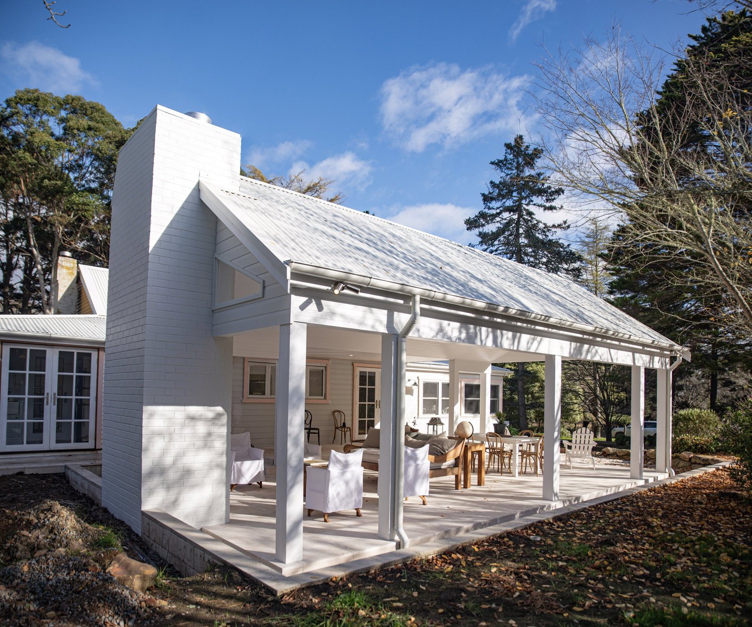 White brick chimney and covered outdoor room, The Oaks extension, Canyonleigh